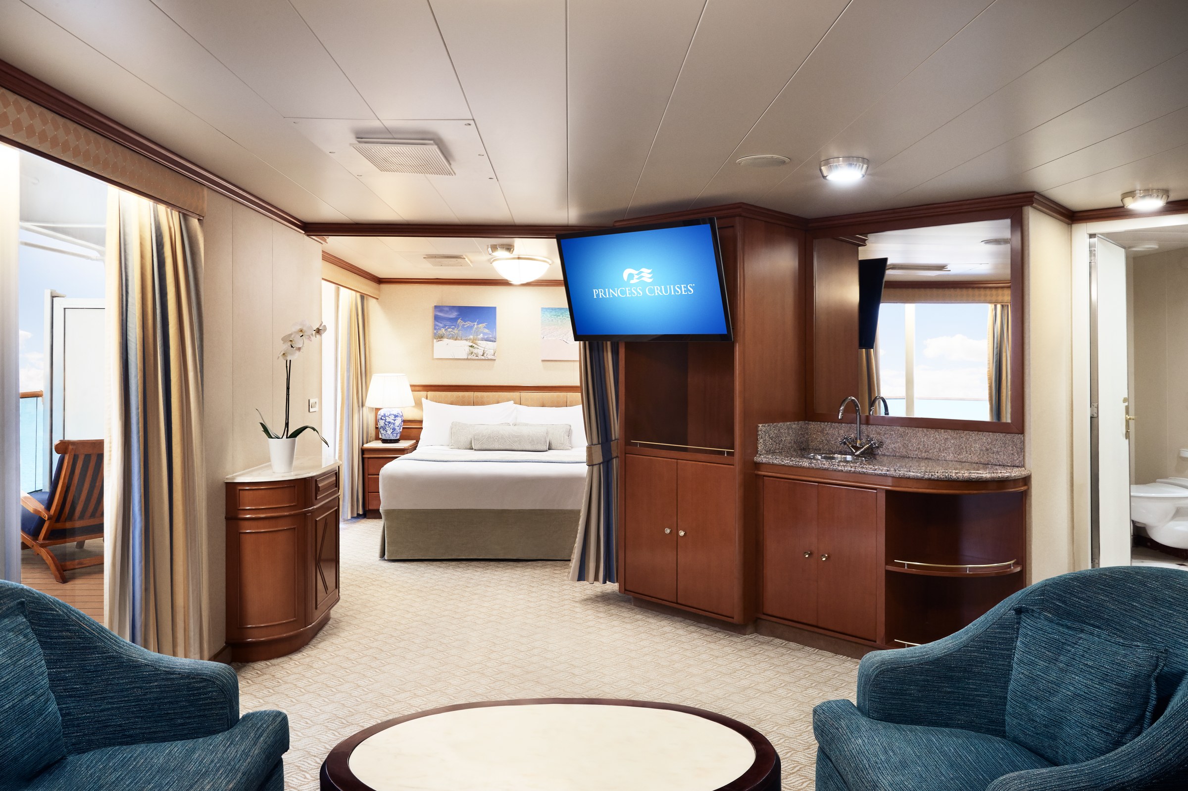 Caribbean Princess Suite sitting area and bedroom