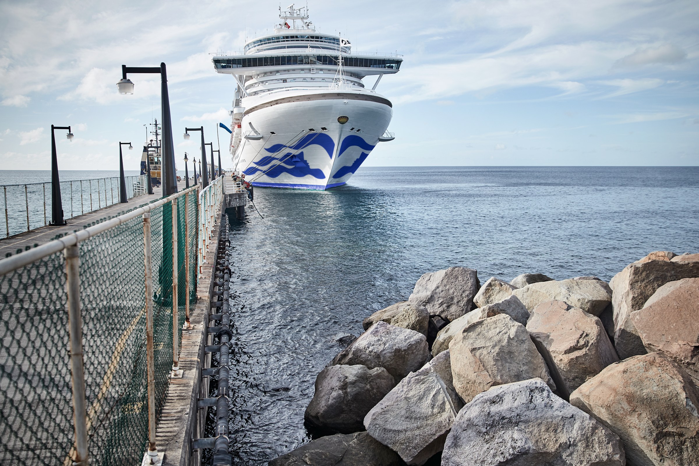 Caribbean Princess bow at the pier in St Kitts on a sunny day