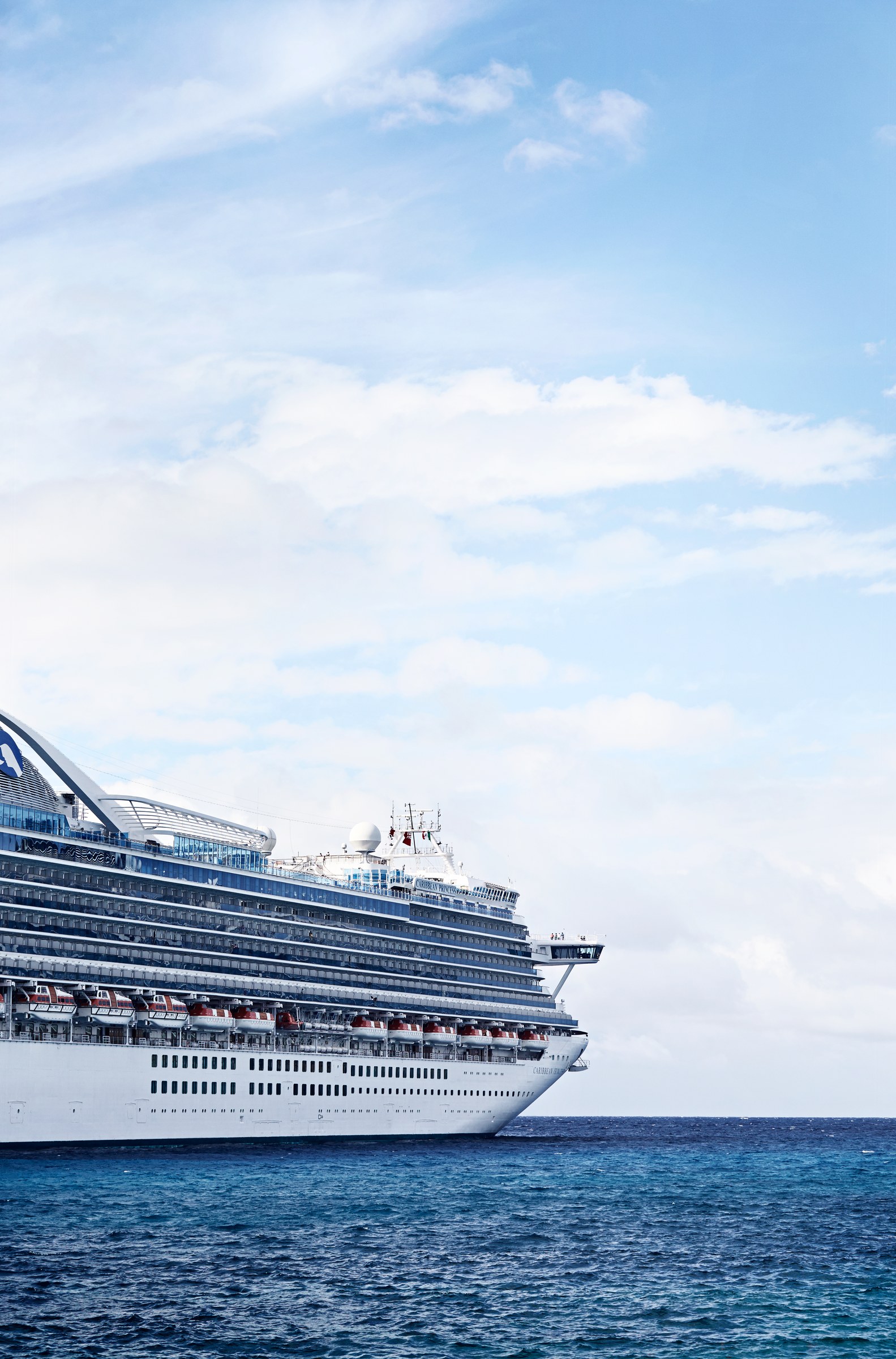 Caribbean Princess stern decks against open blue sea