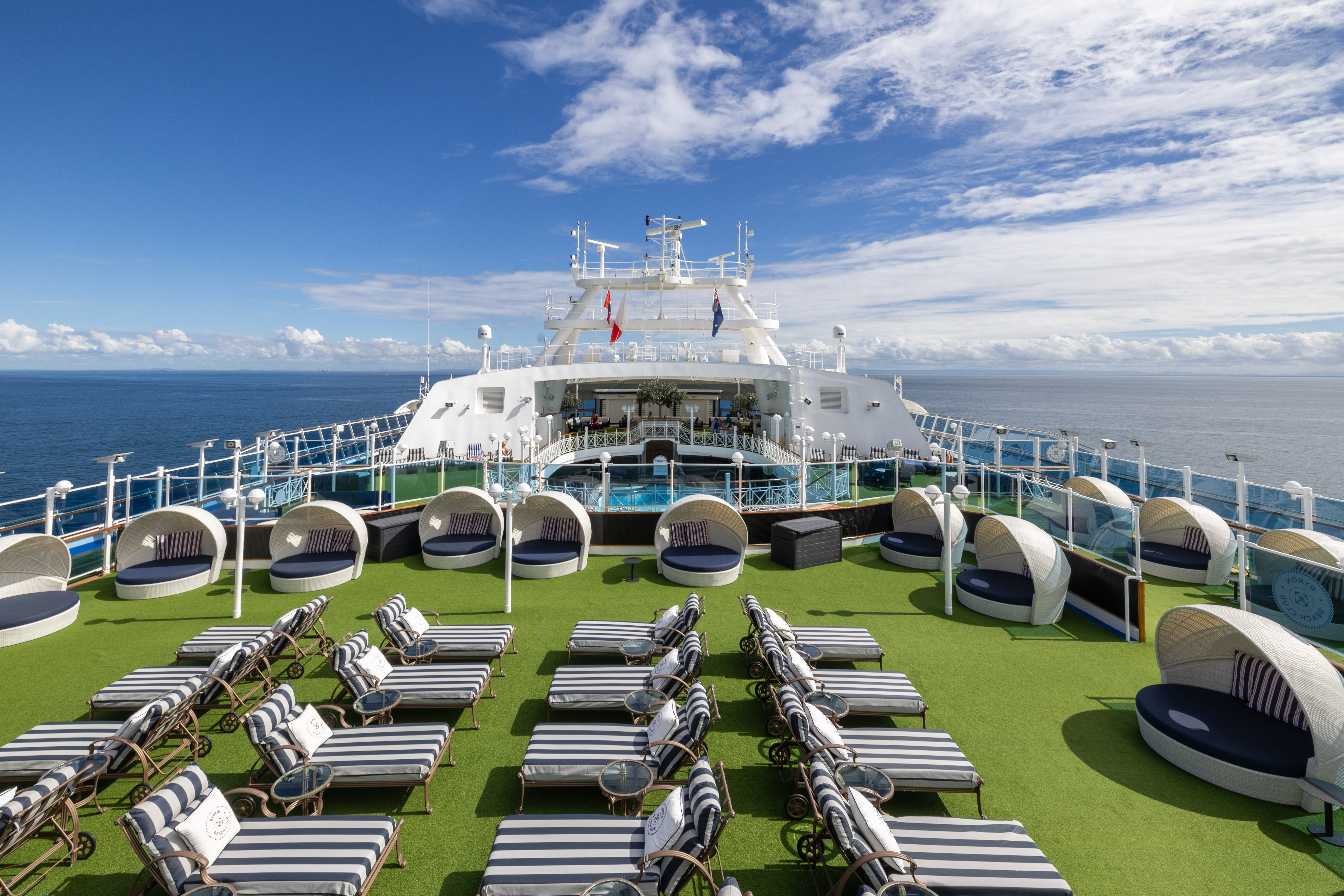 Carnival Adventure Byron Beach Club pool and aft deck on a sunny day