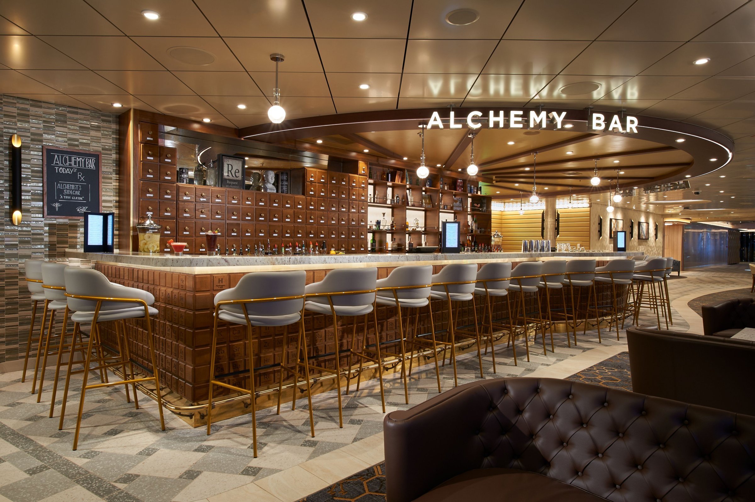 Carnival Celebration Alchemy Bar with velvet stools and apothecary-style back bar