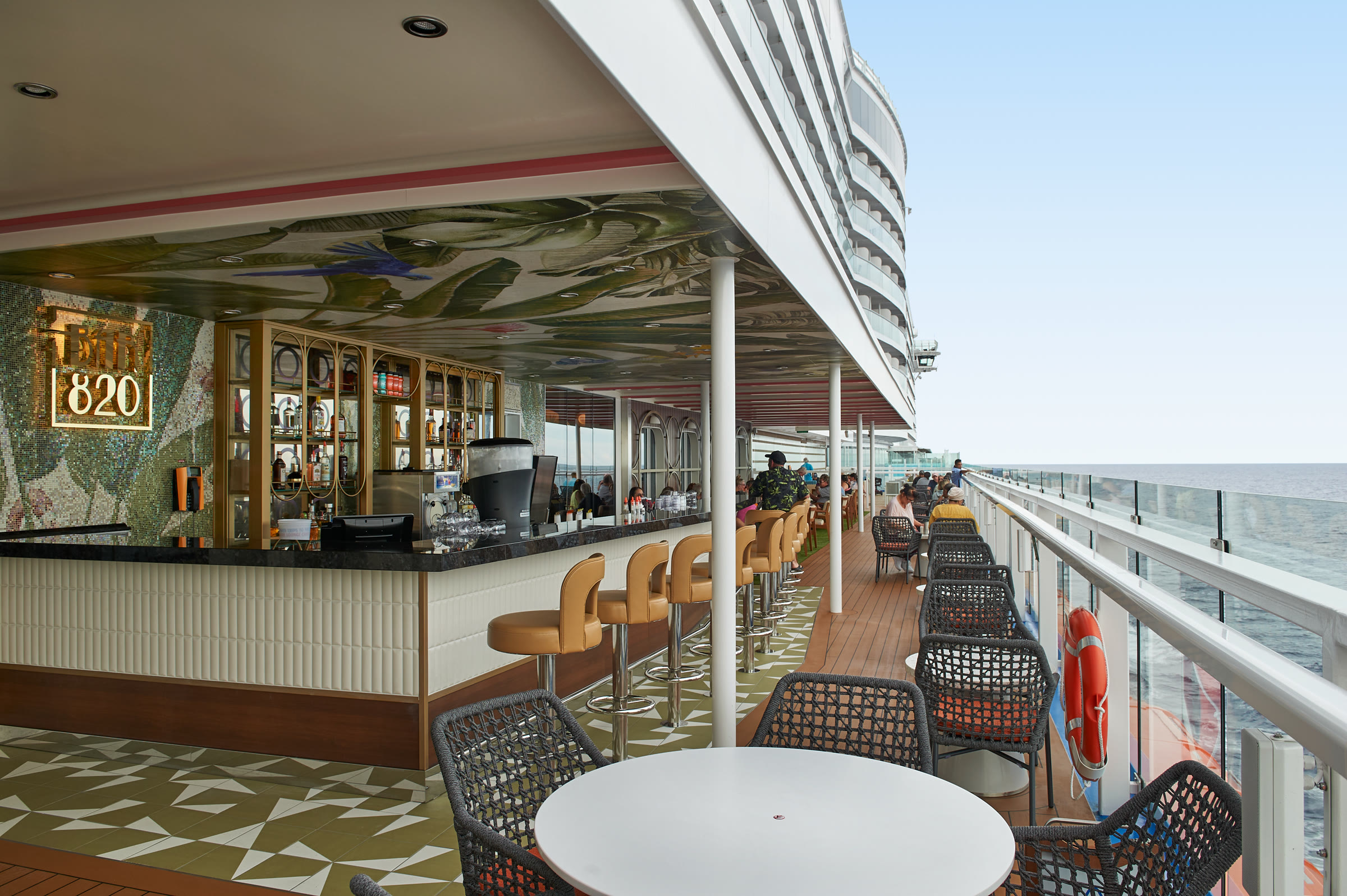Sunny Bar 820 outdoor deck overlooking the ocean aboard Carnival Celebration