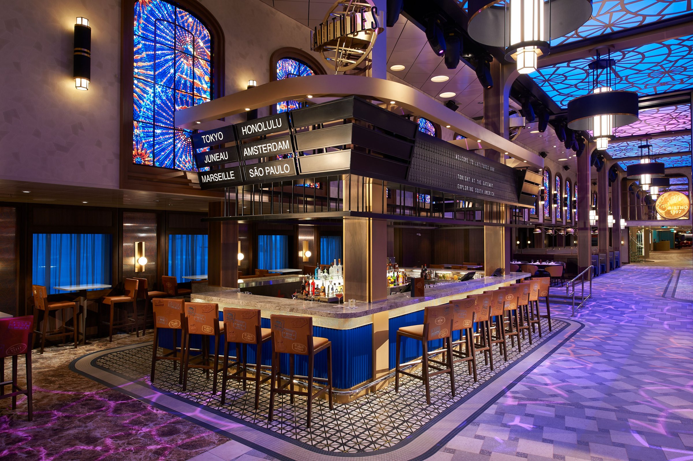 Carnival Celebration Latitudes Bar with a departures board and stained-glass windows
