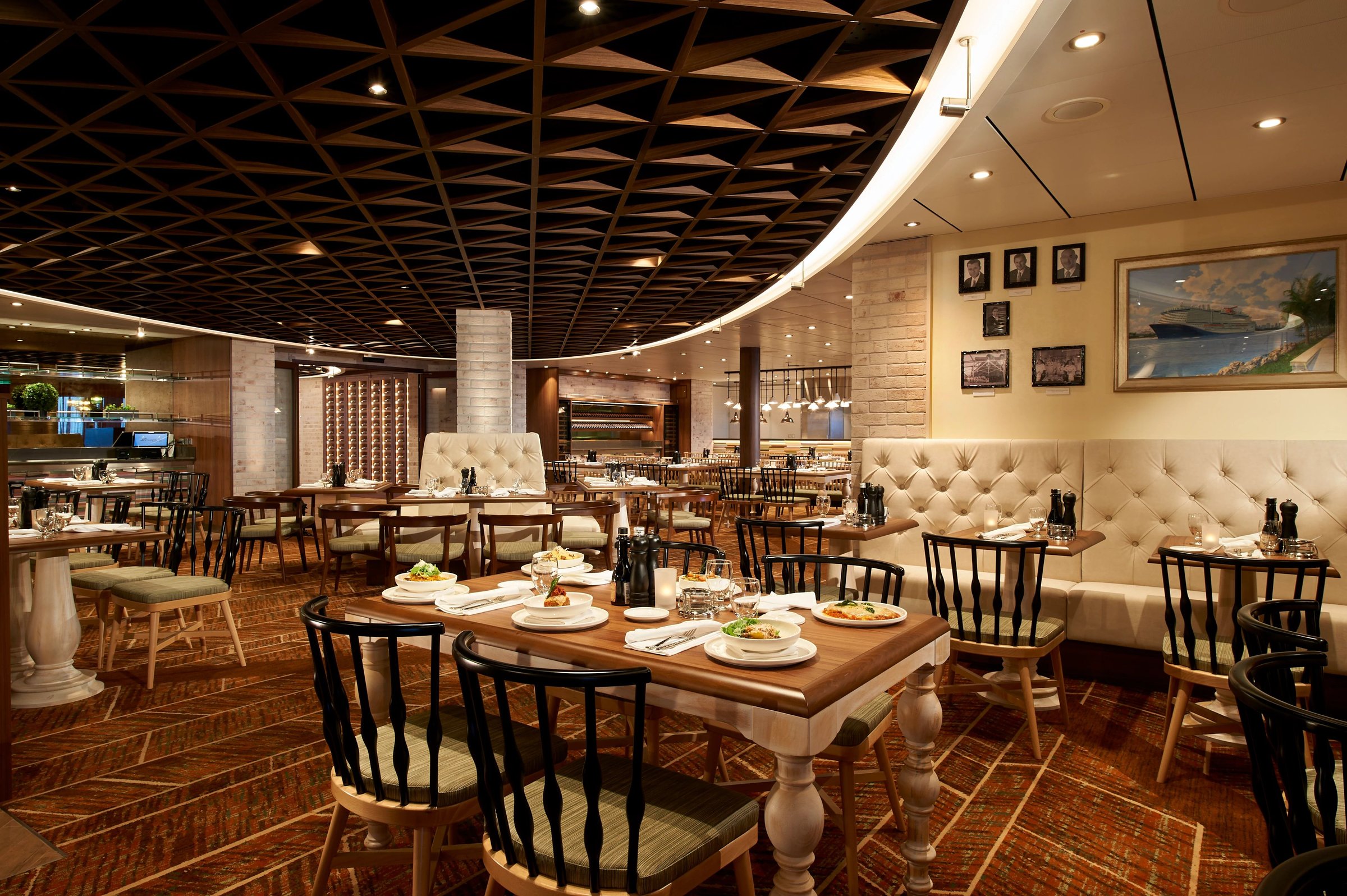 Carnival Celebration Cucina del Capitano with farmhouse tables and tufted banquettes