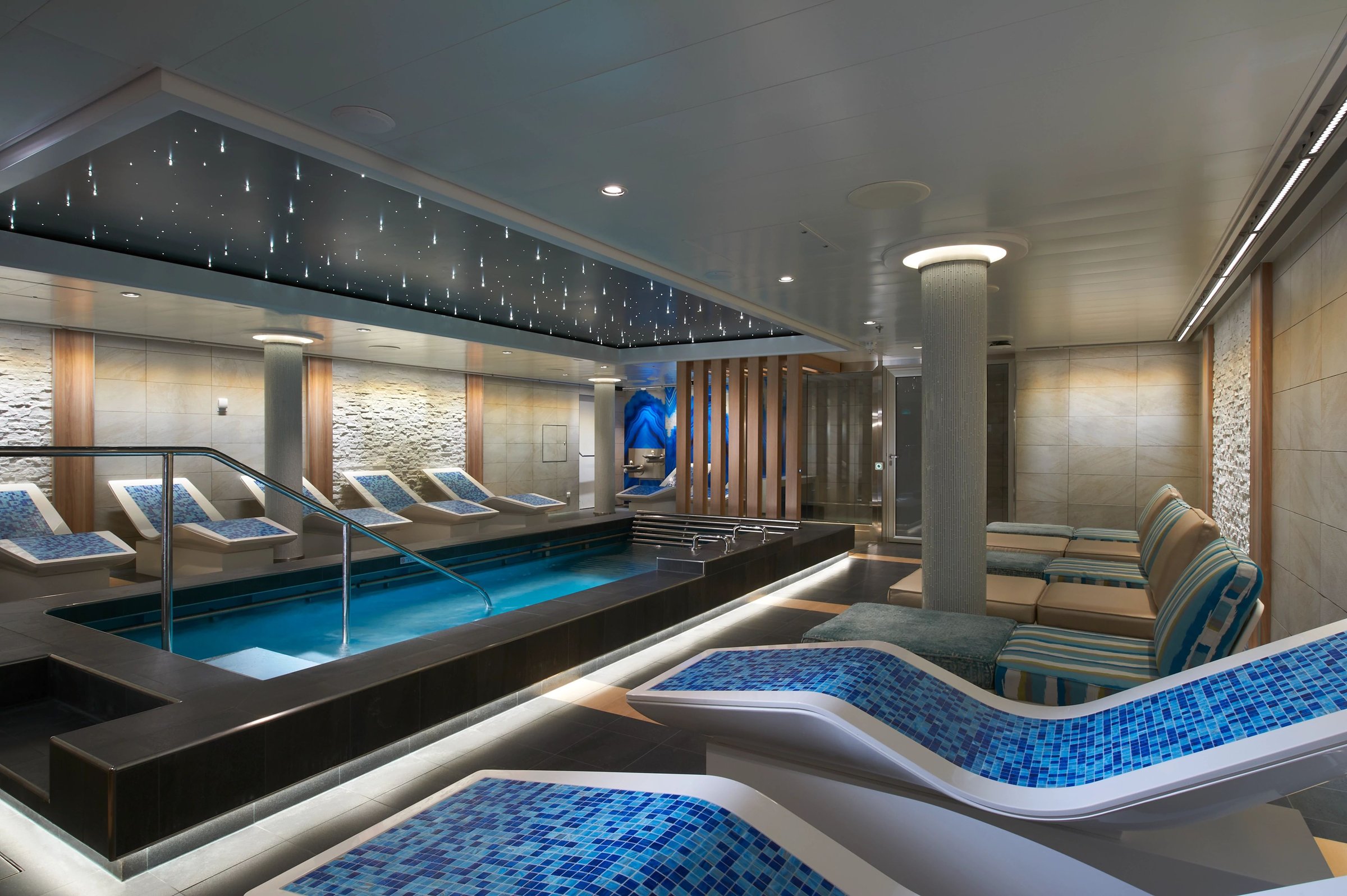 Carnival Celebration Cloud 9 thermal suite with tiled heated loungers and a hydrotherapy pool