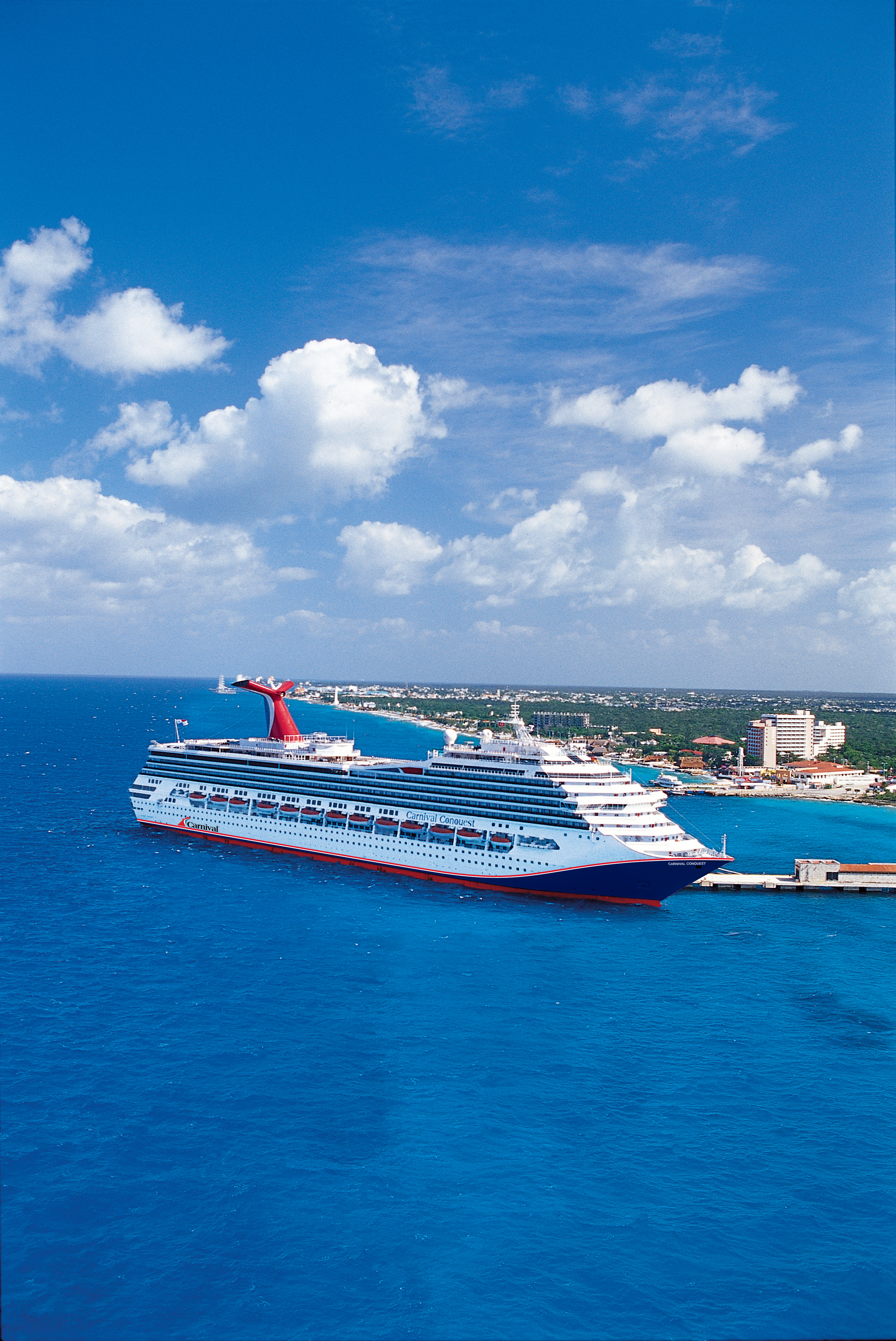 Carnival Conquest blue hull aerial docked