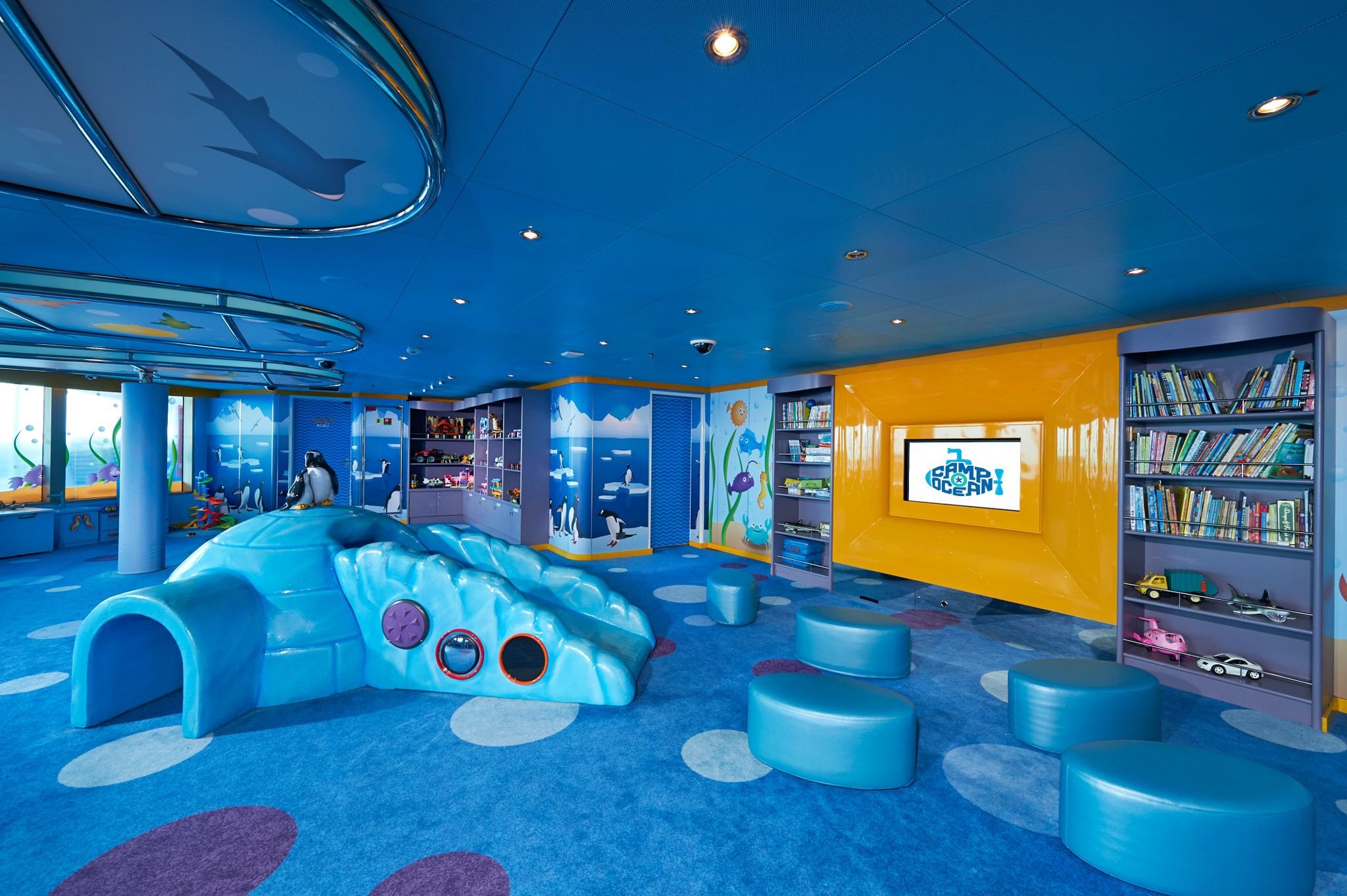 Carnival Dream Camp Ocean kids club with an igloo play structure, seating pods and bookshelves