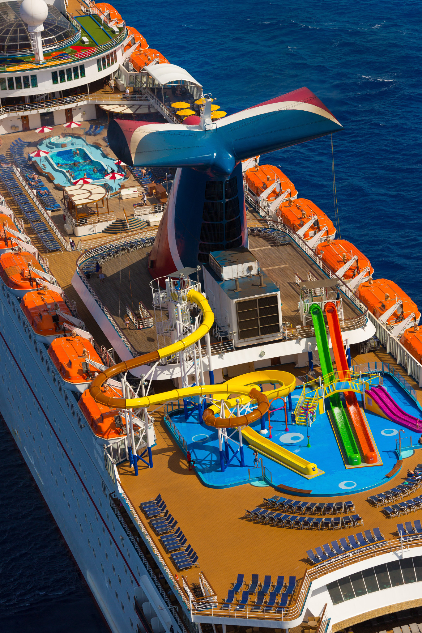 Carnival Elation WaterWorks slides and pool decks from above on a sunny day