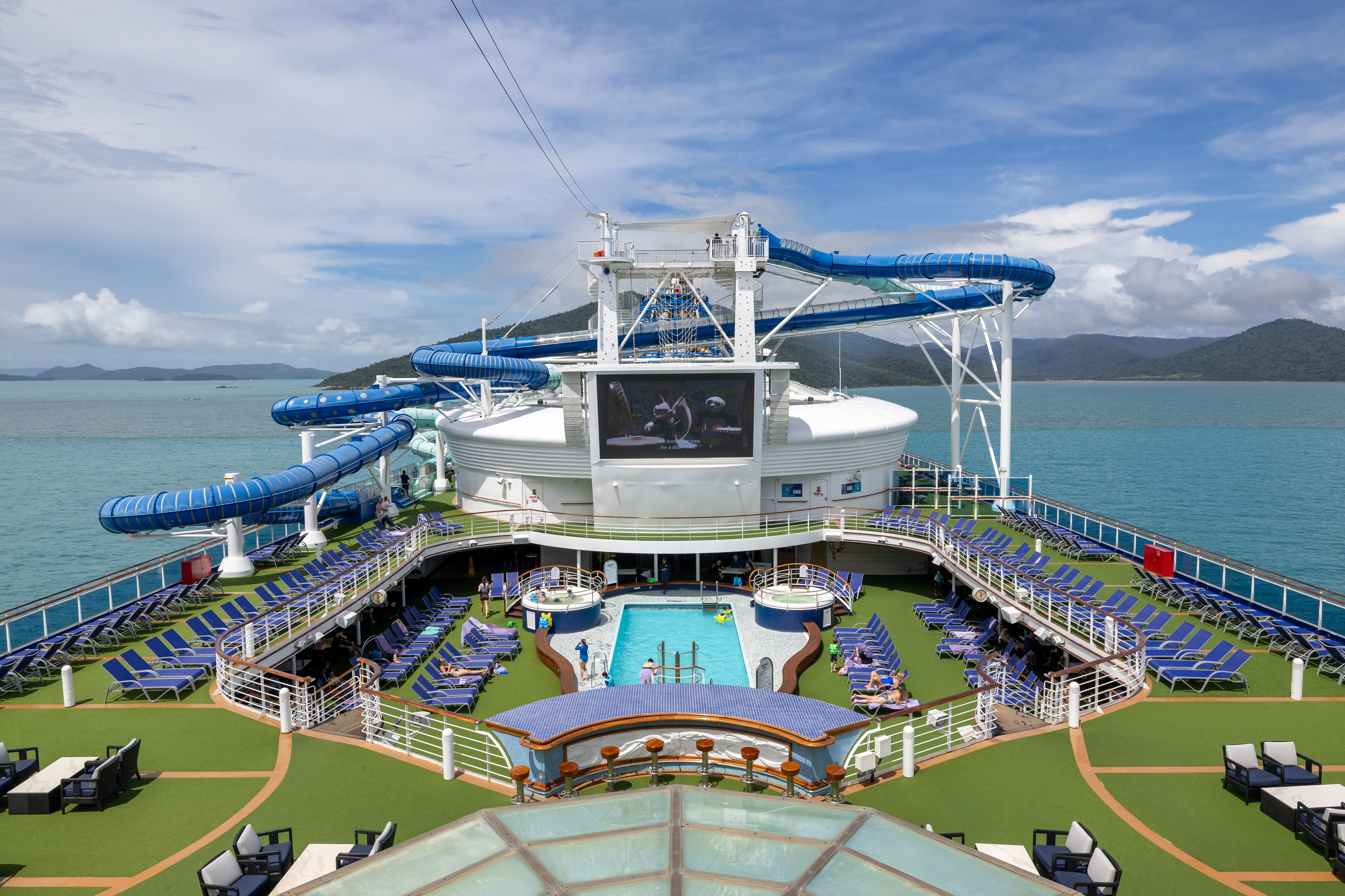 Carnival Encounter WaterWorks pool deck, sunny