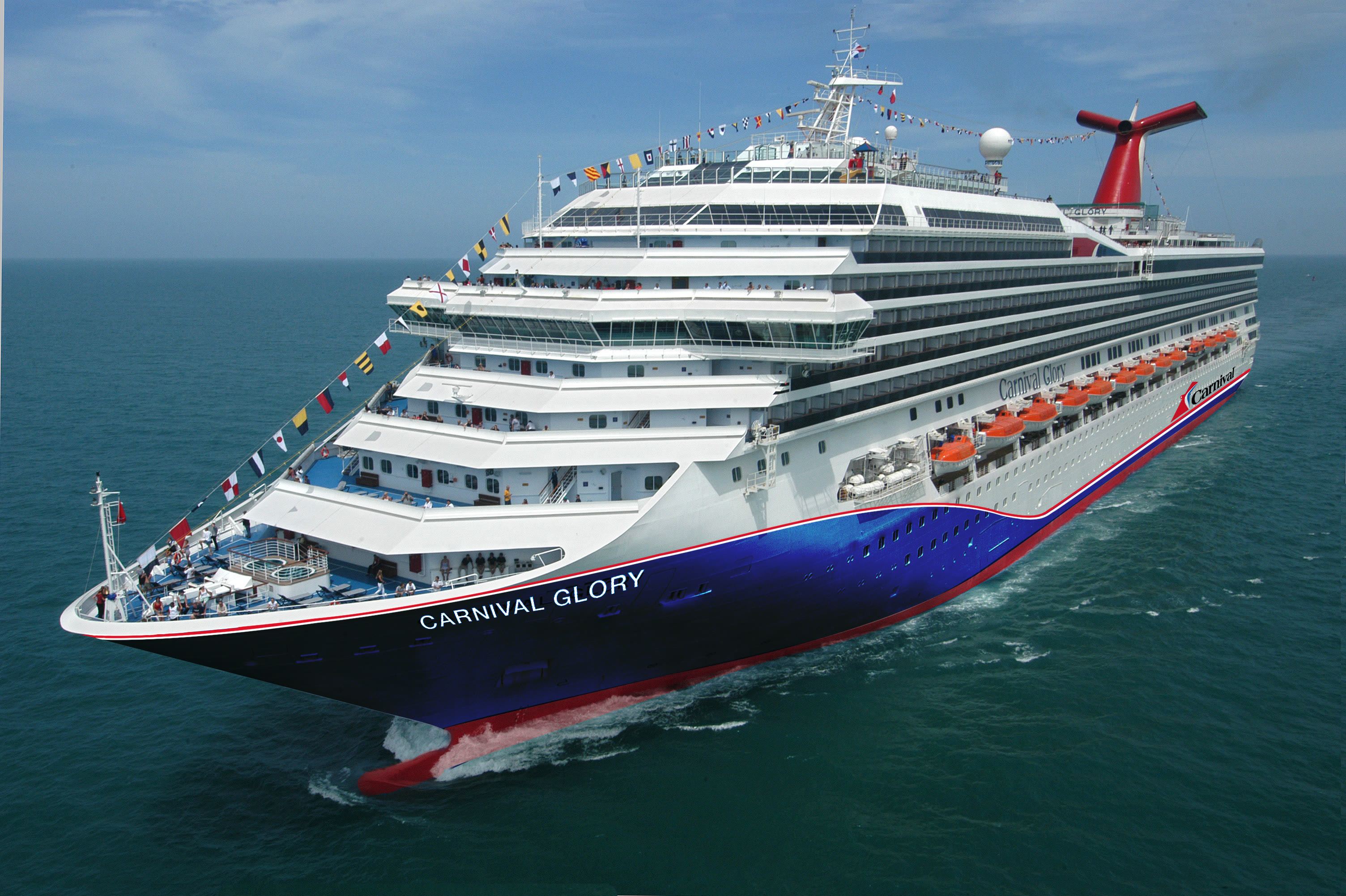 Carnival Glory blue hull aerial at sea, daytime