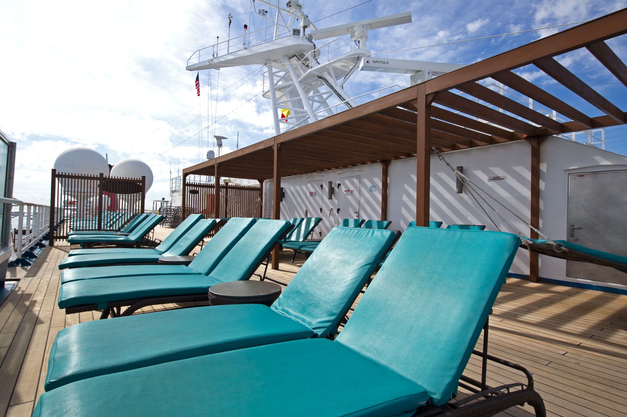 Carnival Glory Serenity adult deck teal loungers, sunny