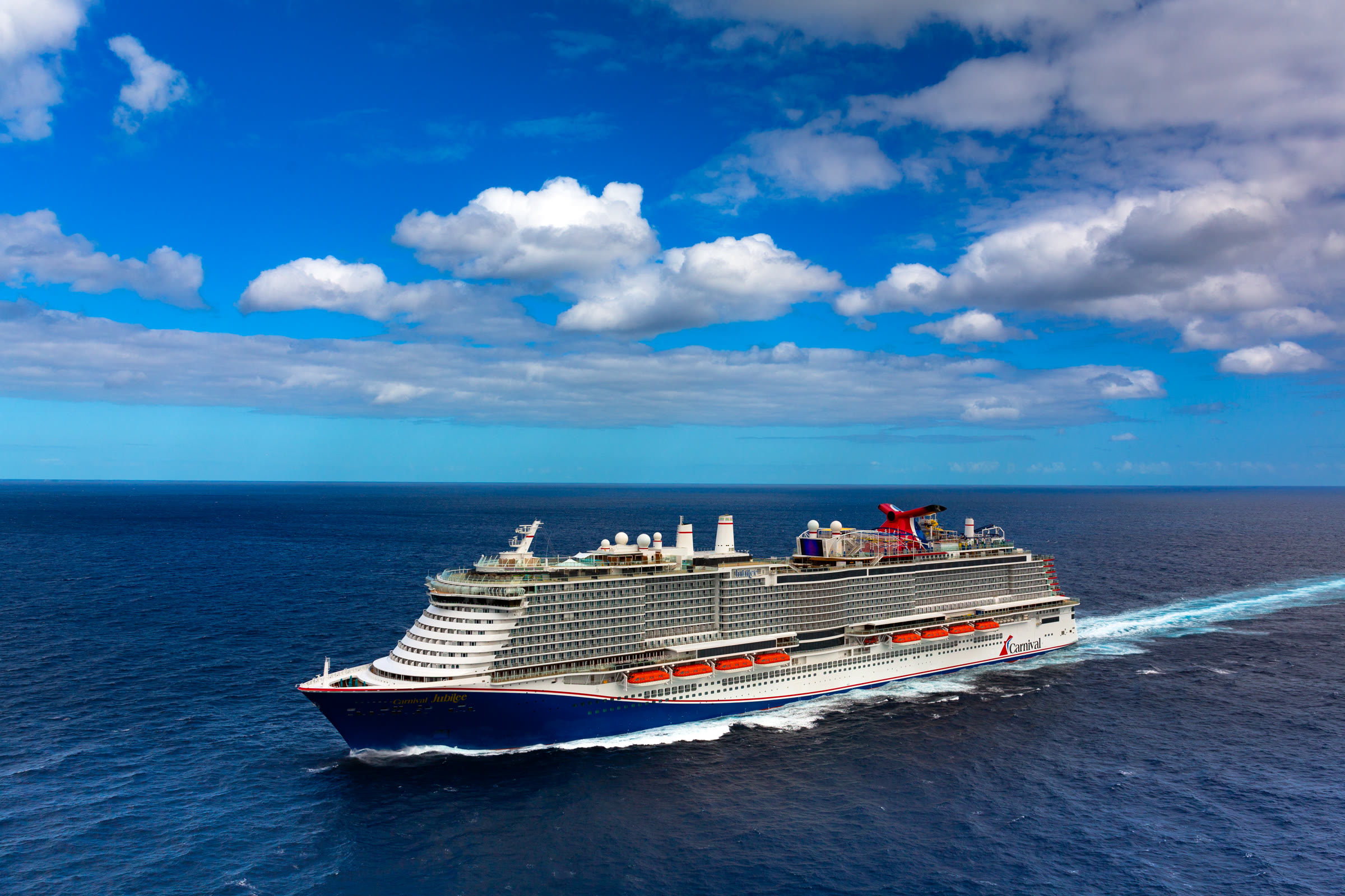 Carnival Jubilee sunny open-water profile aerial exterior
