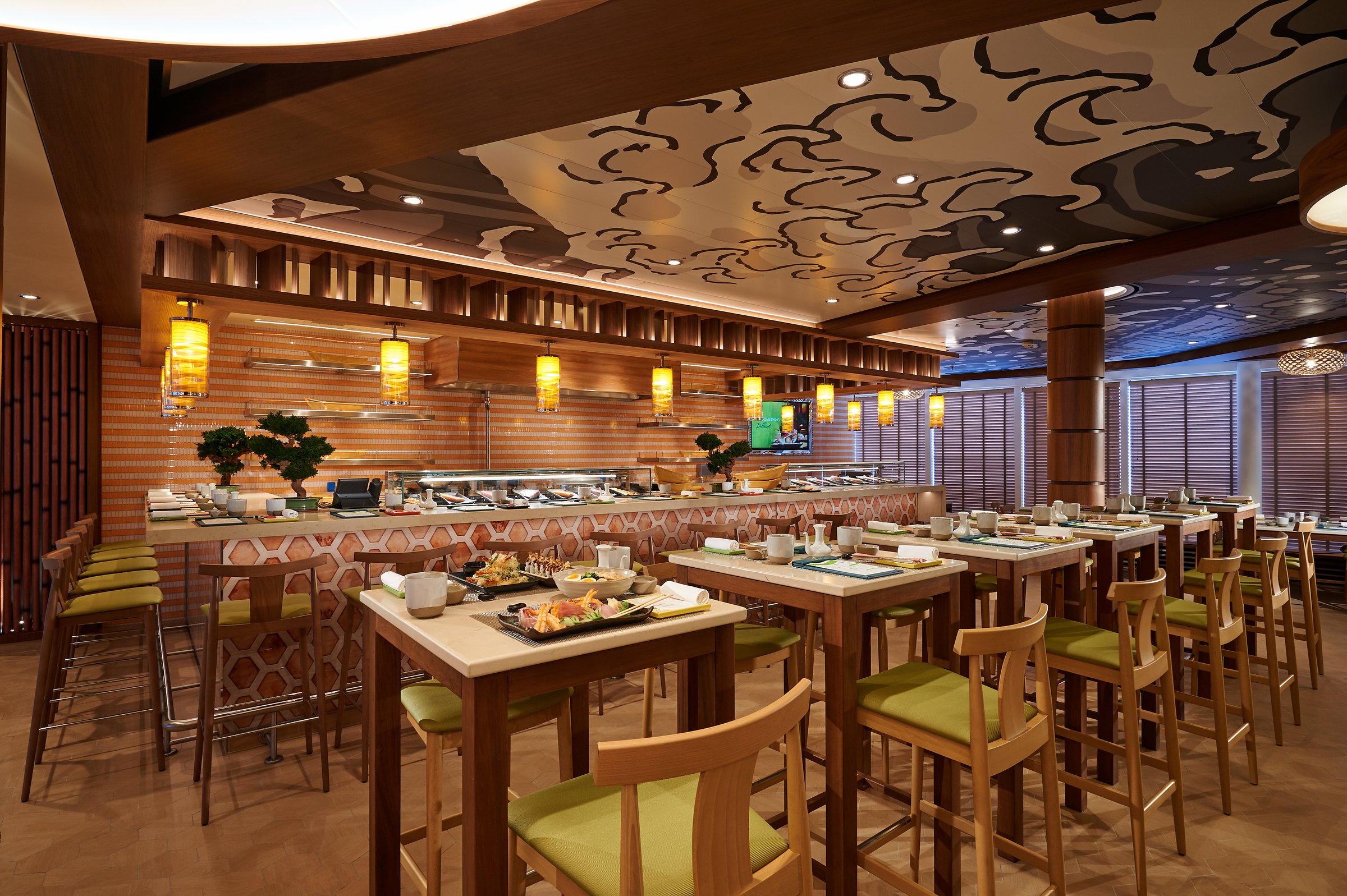 Carnival Jubilee Bonsai Sushi and Teppanyaki dining room with wooden tables