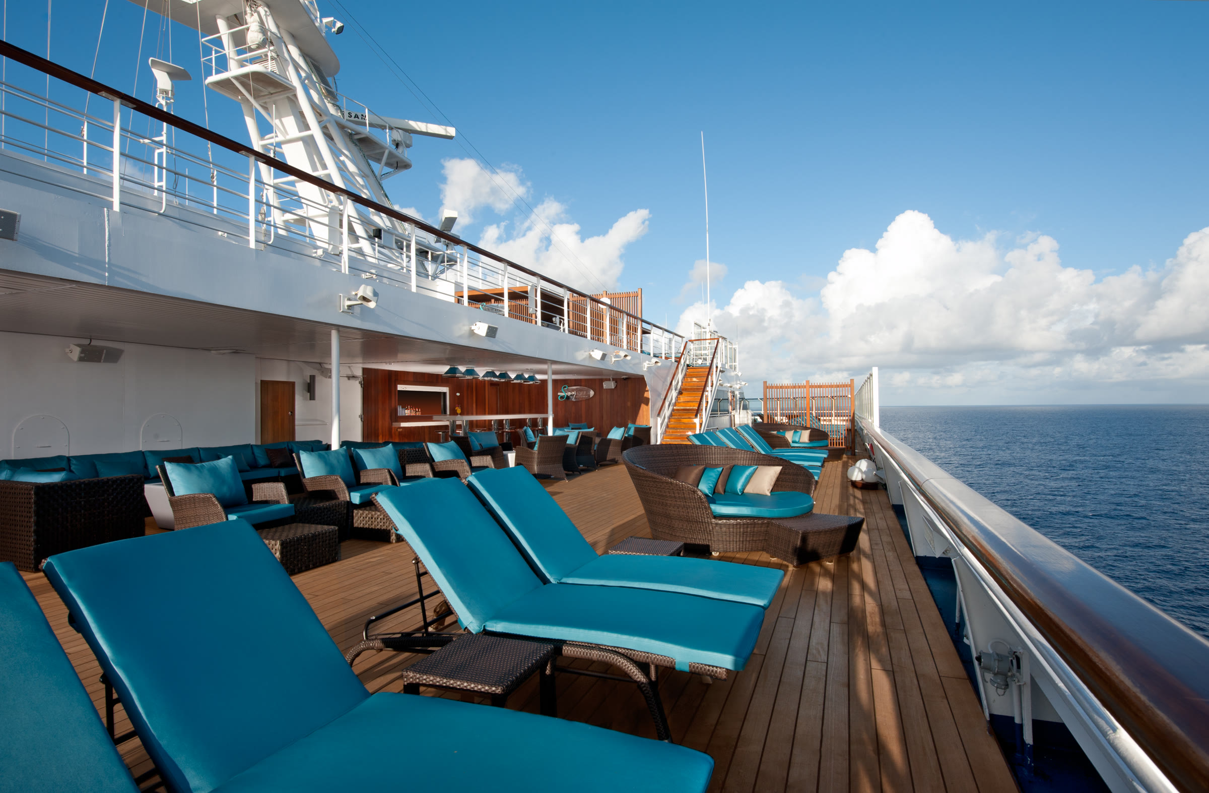 Carnival Liberty Serenity adult deck loungers, bright blue sky