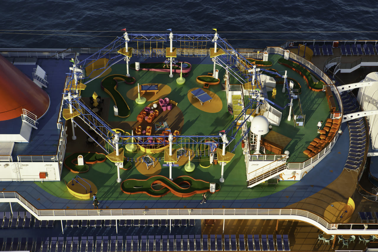 Carnival Magic sunny SportsSquare mini-golf and ropes course deck
