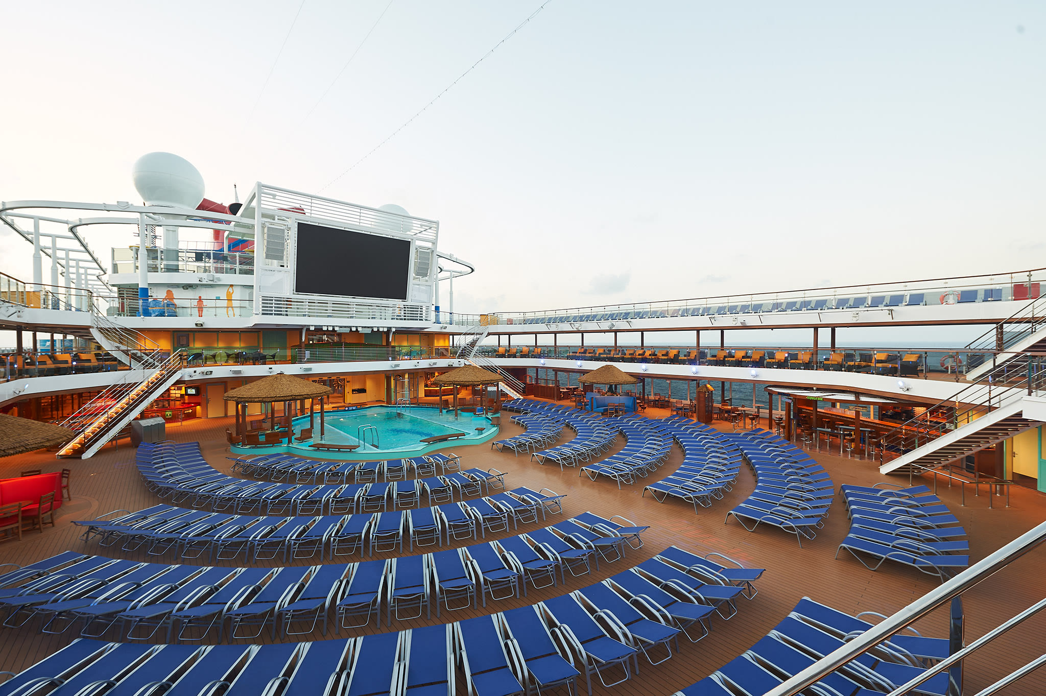 Sunny Beach Pool deck and Seaside Theater aboard Carnival Panorama