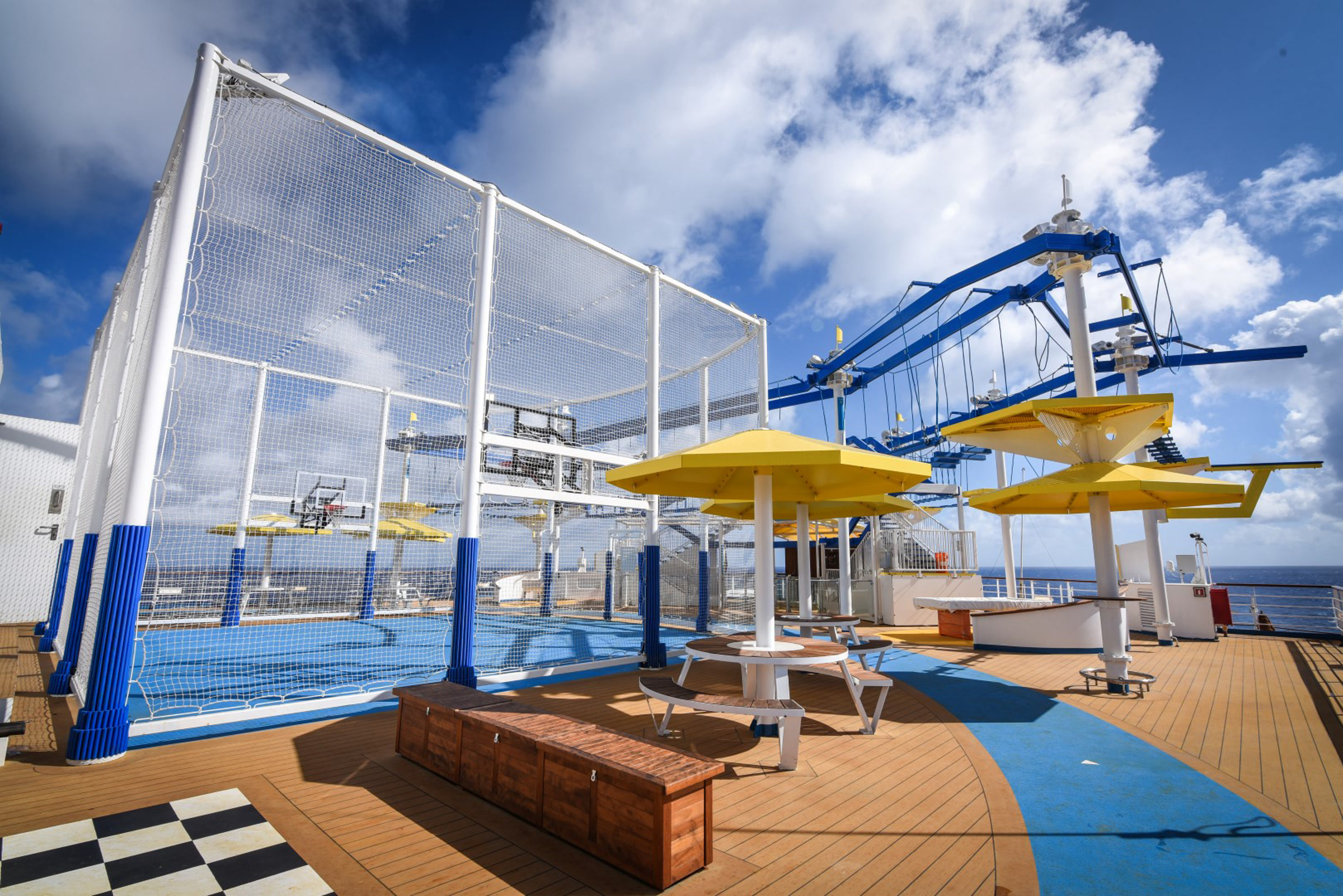 Carnival Radiance Sports outdoor venue, bright sunny daytime, no talent