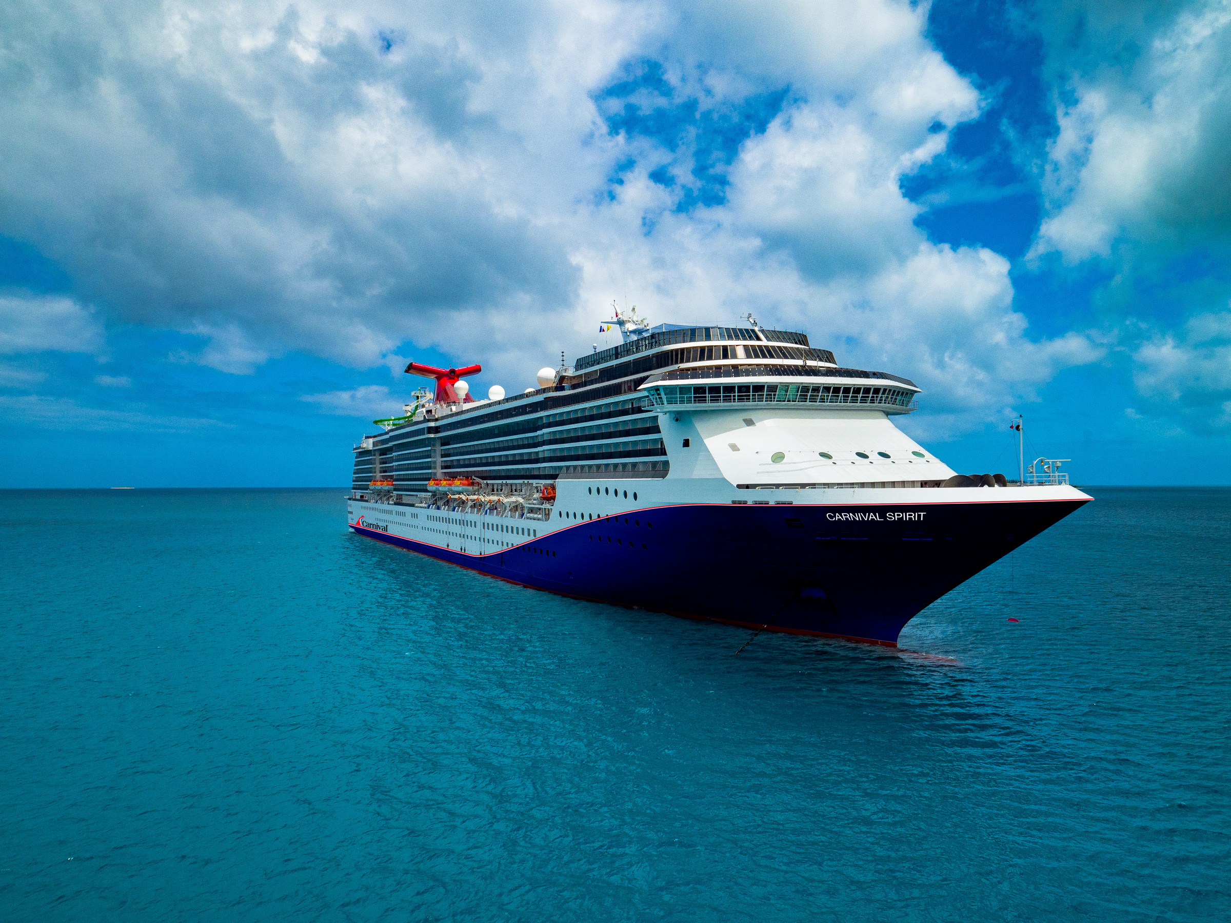 Carnival Spirit blue-hull aerial exterior in bright daylight