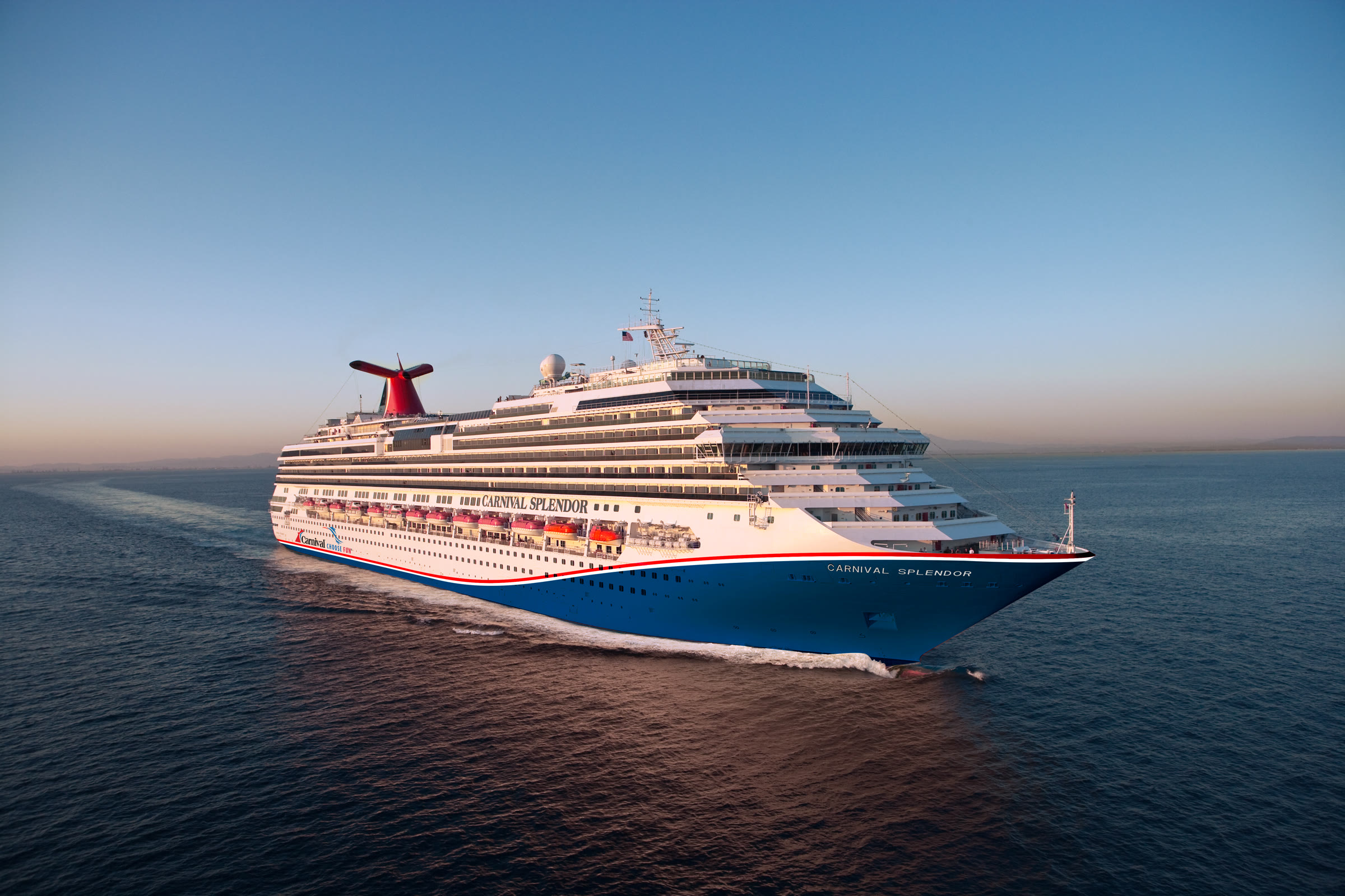 Carnival Splendor blue-hull aerial exterior sailing under clear sky