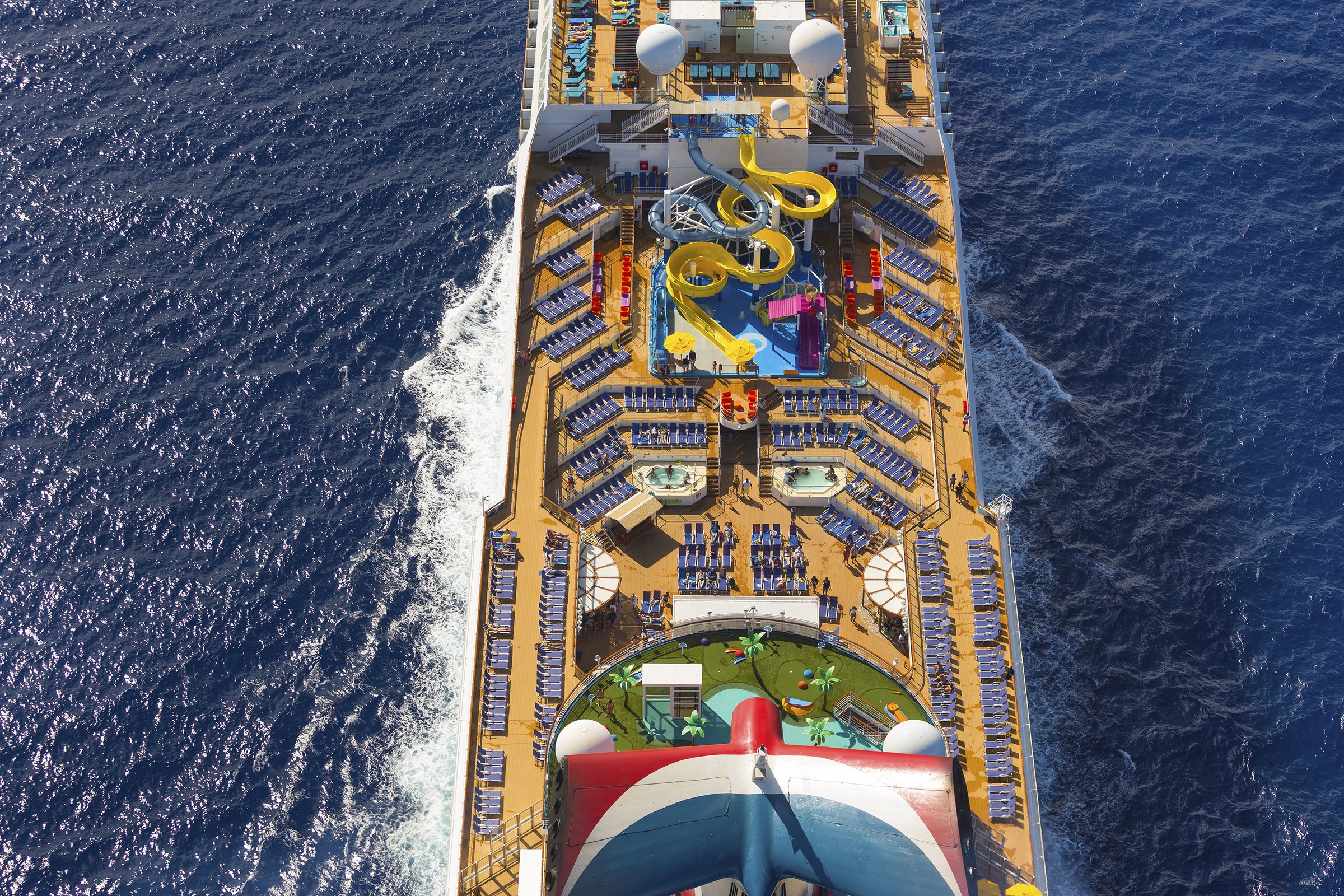 Carnival Sunrise aerial view from astern over the pool decks, WaterWorks and mini golf