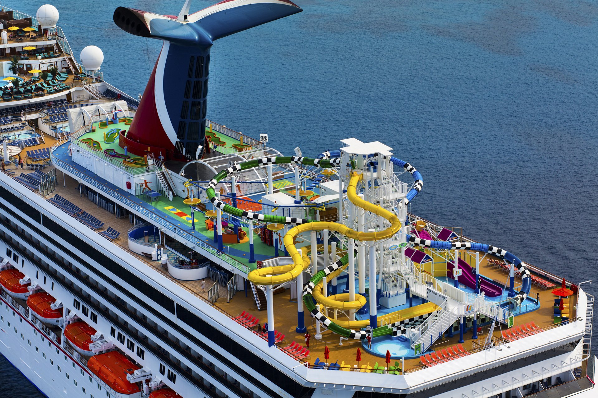 Carnival Sunshine aerial view of the stern with the funnel, WaterWorks slides and mini golf