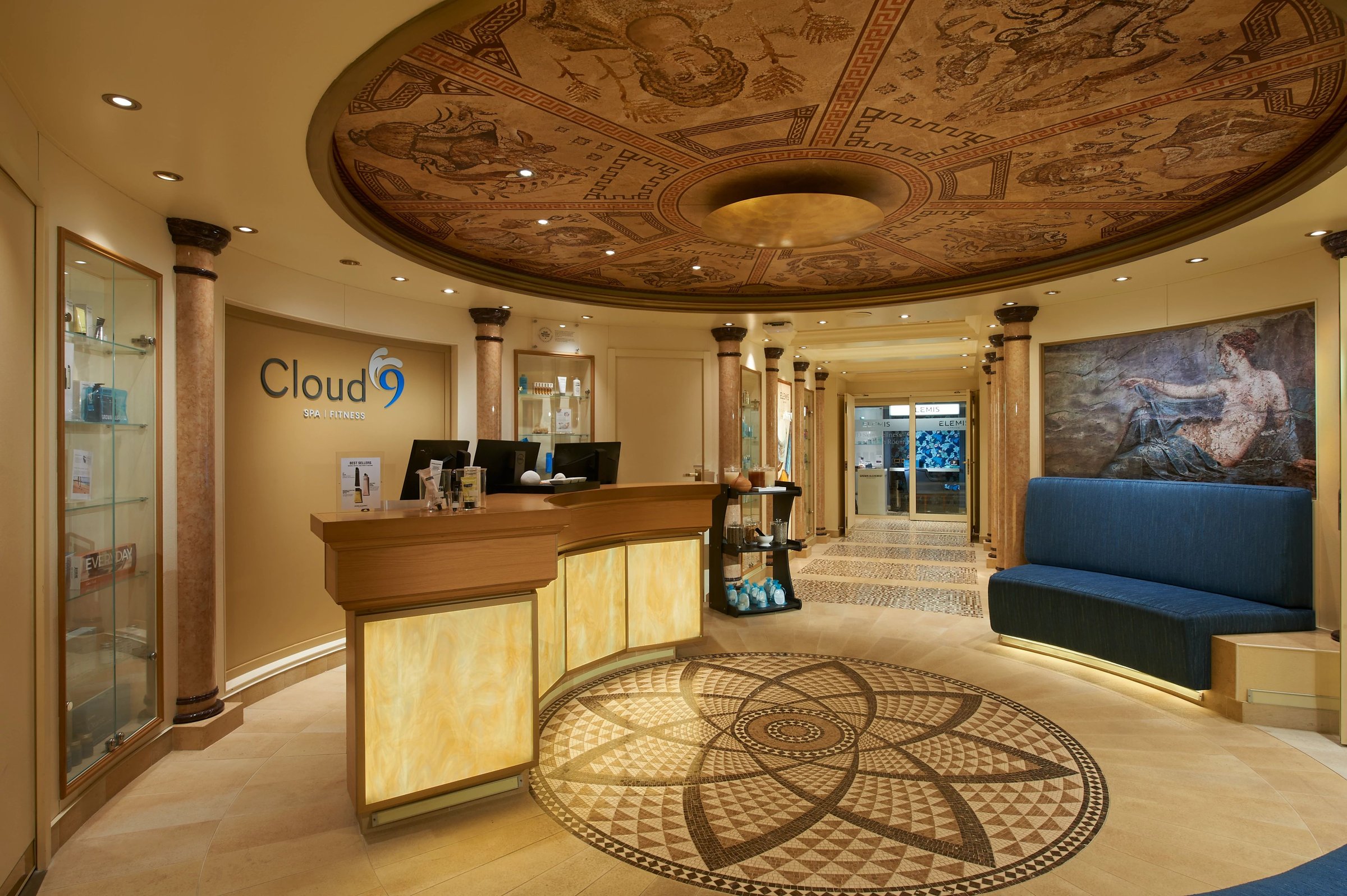 Carnival Venezia Cloud 9 Spa reception with a mosaic floor, painted dome ceiling and columns