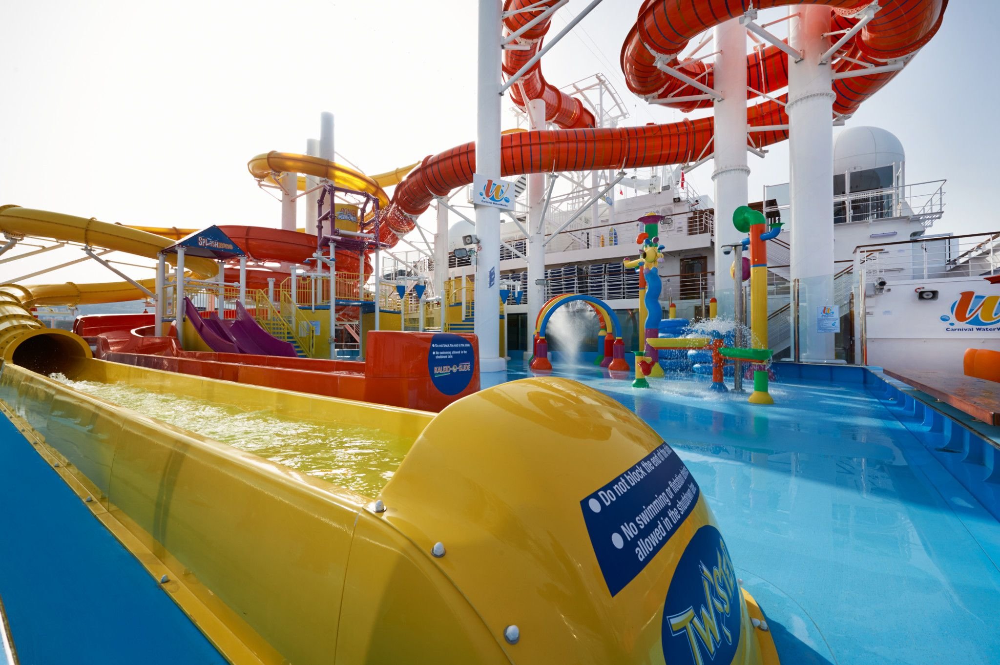 Carnival Vista WaterWorks with yellow, red and orange slides above the splash zone