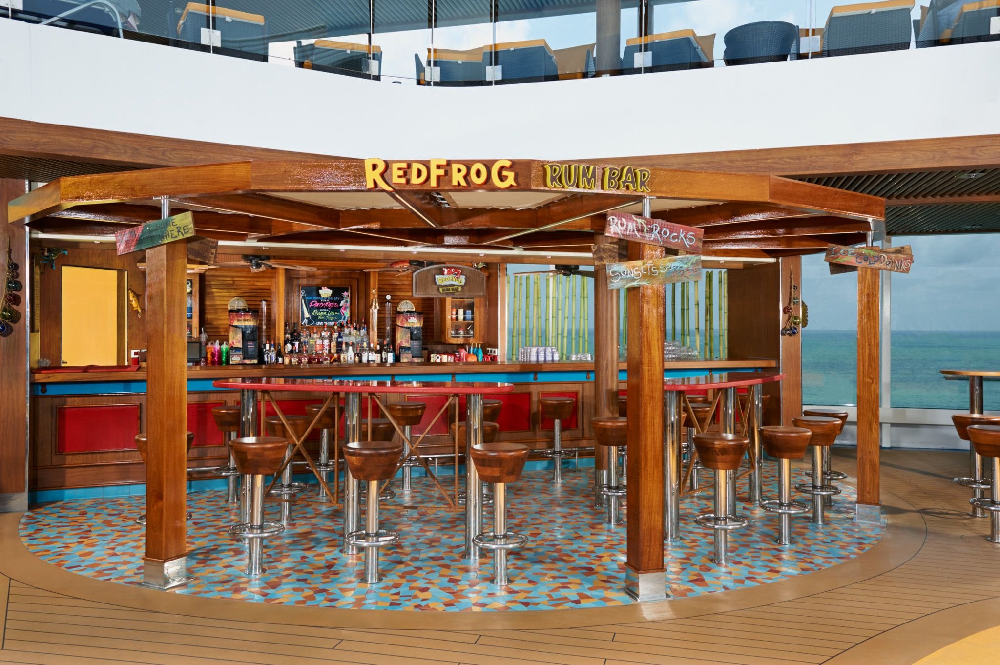 Carnival Vista RedFrog Rum Bar on the open deck with wooden beams and a sea view