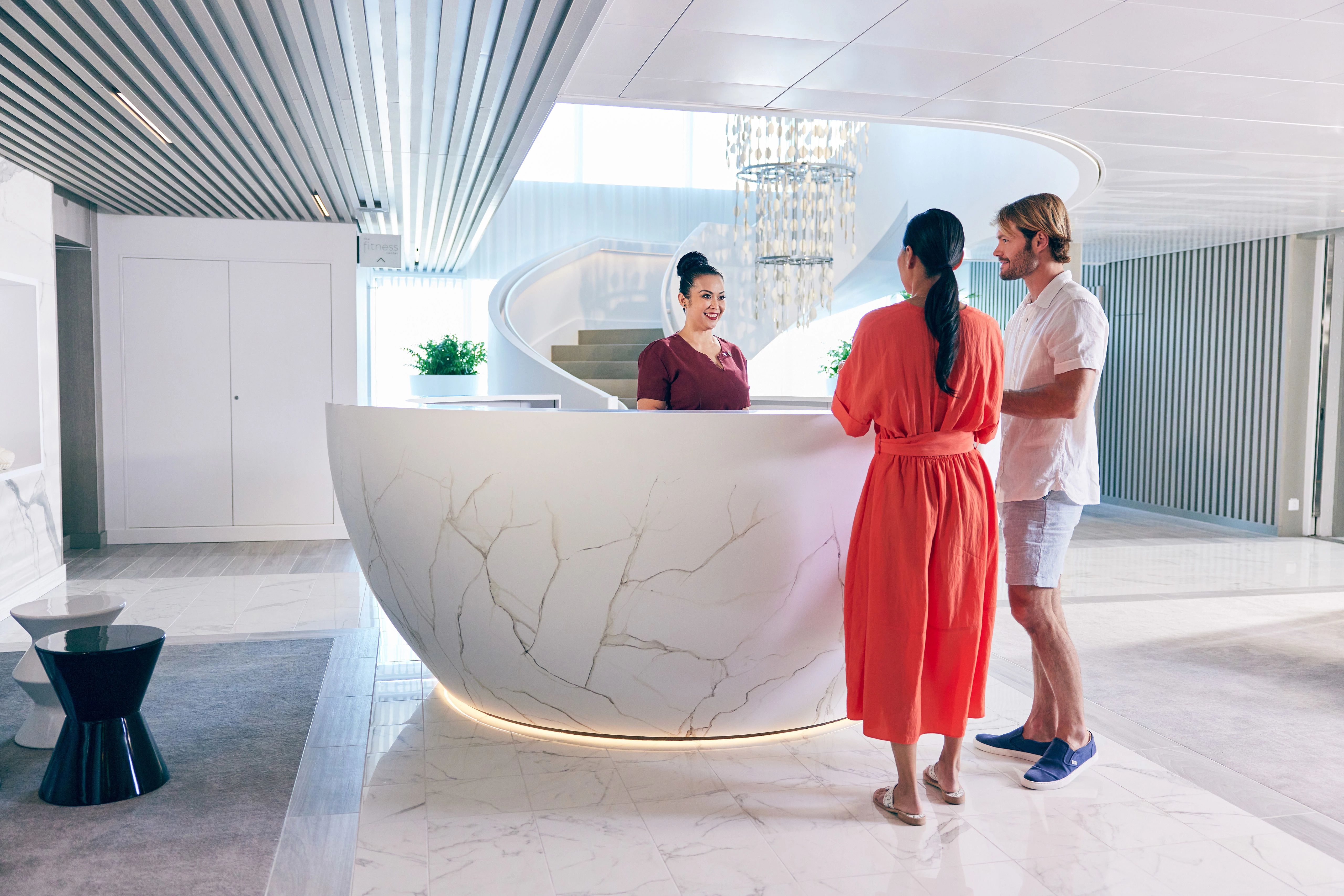 Celebrity Beyond spa reception with Fitness Center beyond
