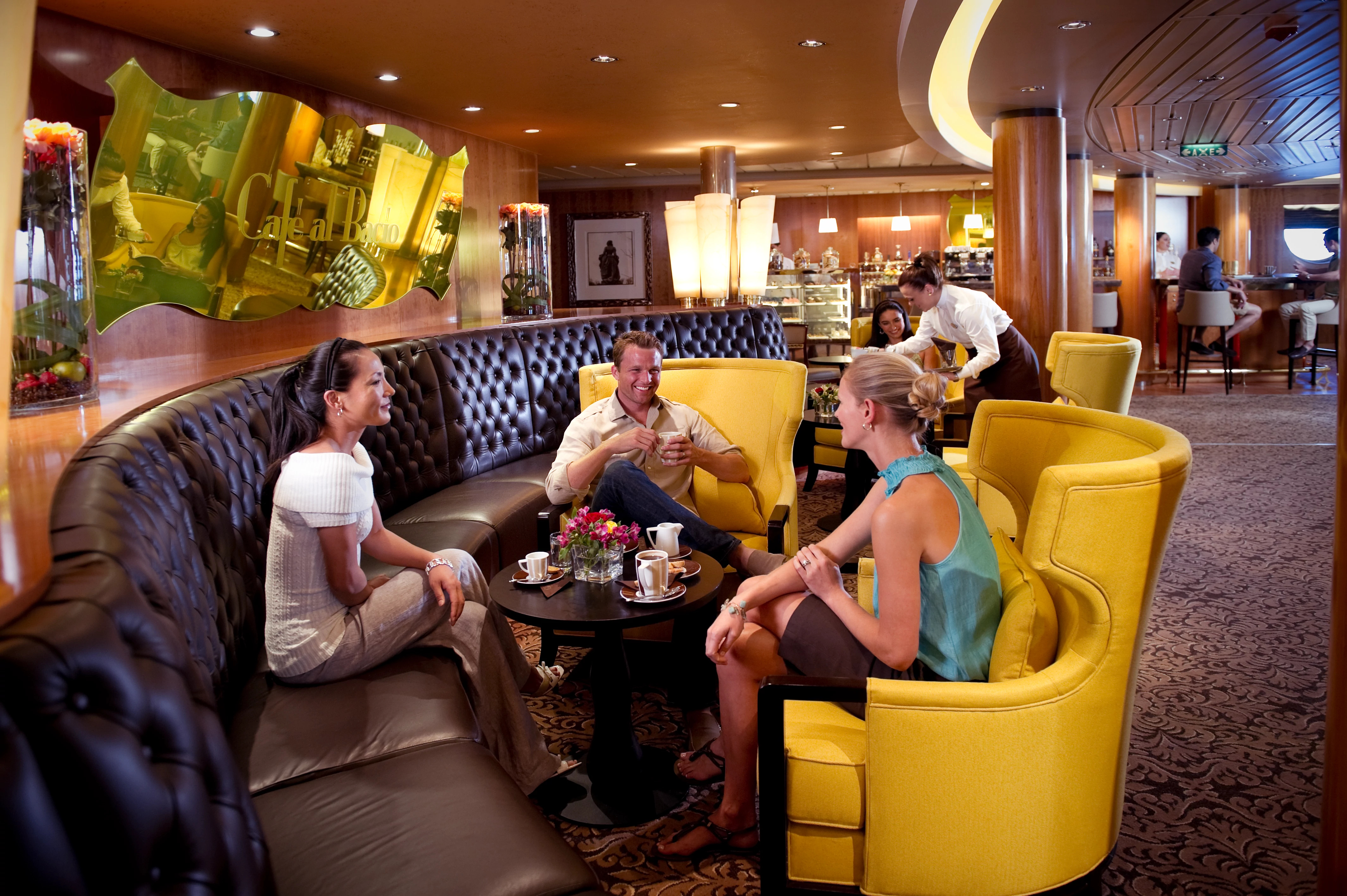 Celebrity Constellation Café al Bacio lounge with yellow wing chairs