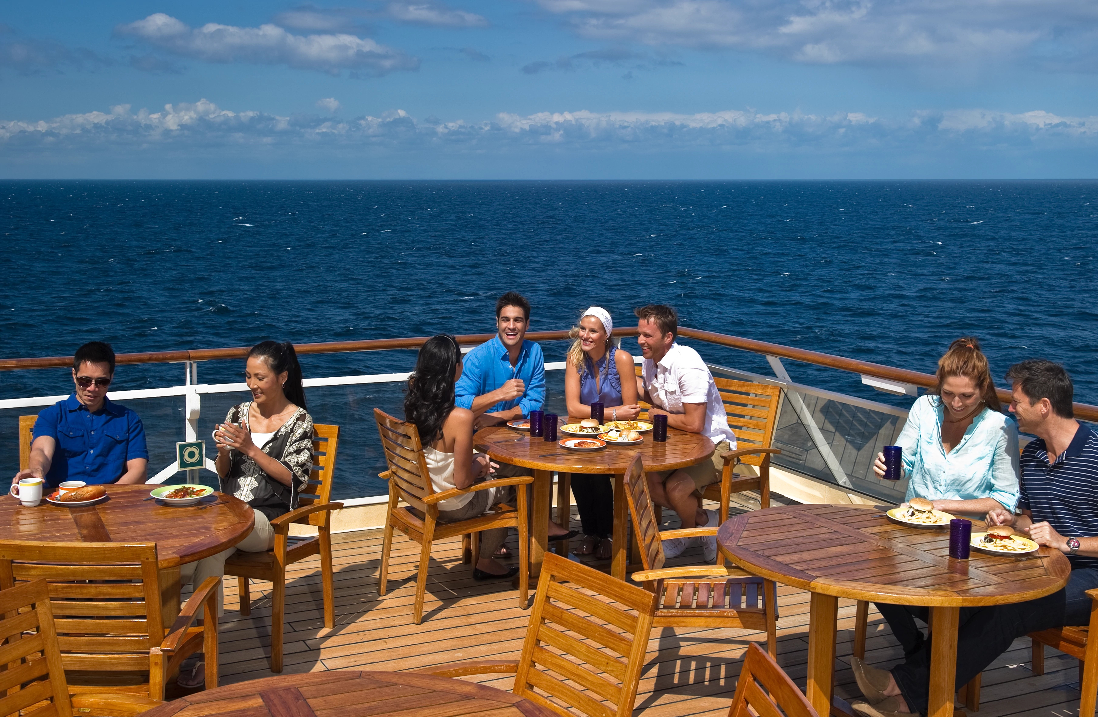 Celebrity Constellation sunny aft deck outdoor dining over blue ocean