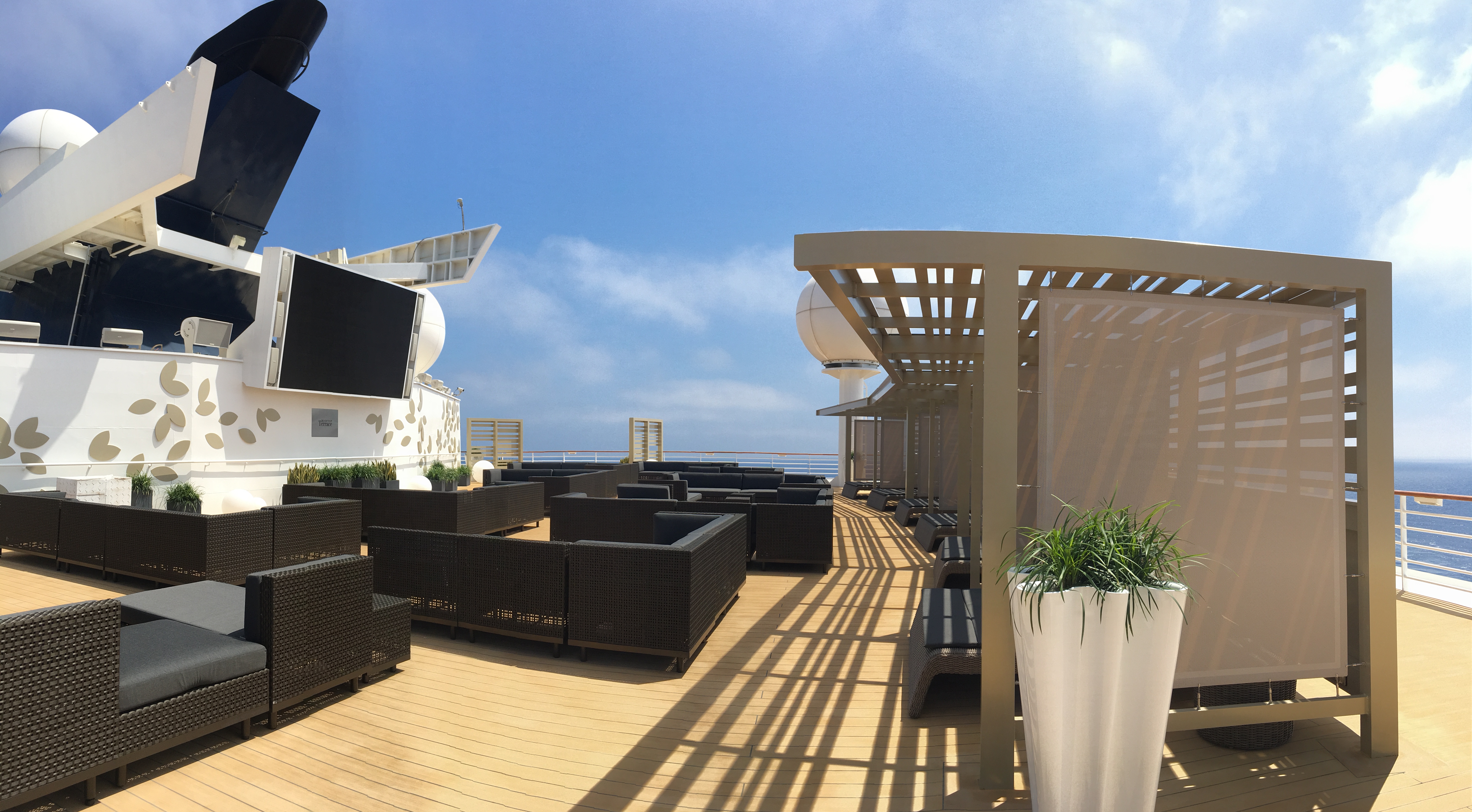 Celebrity Constellation Rooftop Terrace lounge under a clear blue sky