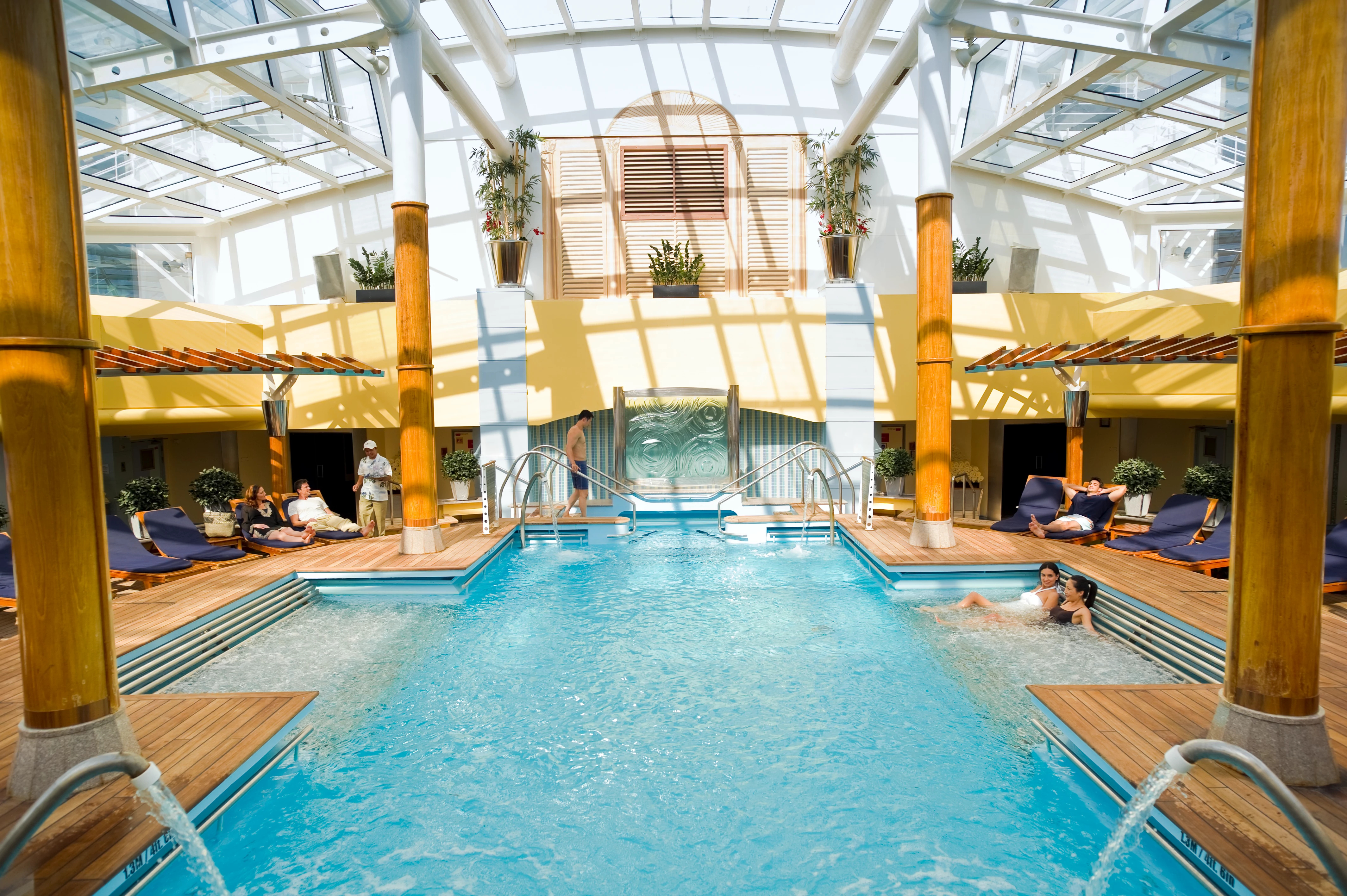 Celebrity Constellation Solarium indoor pool under a glass roof