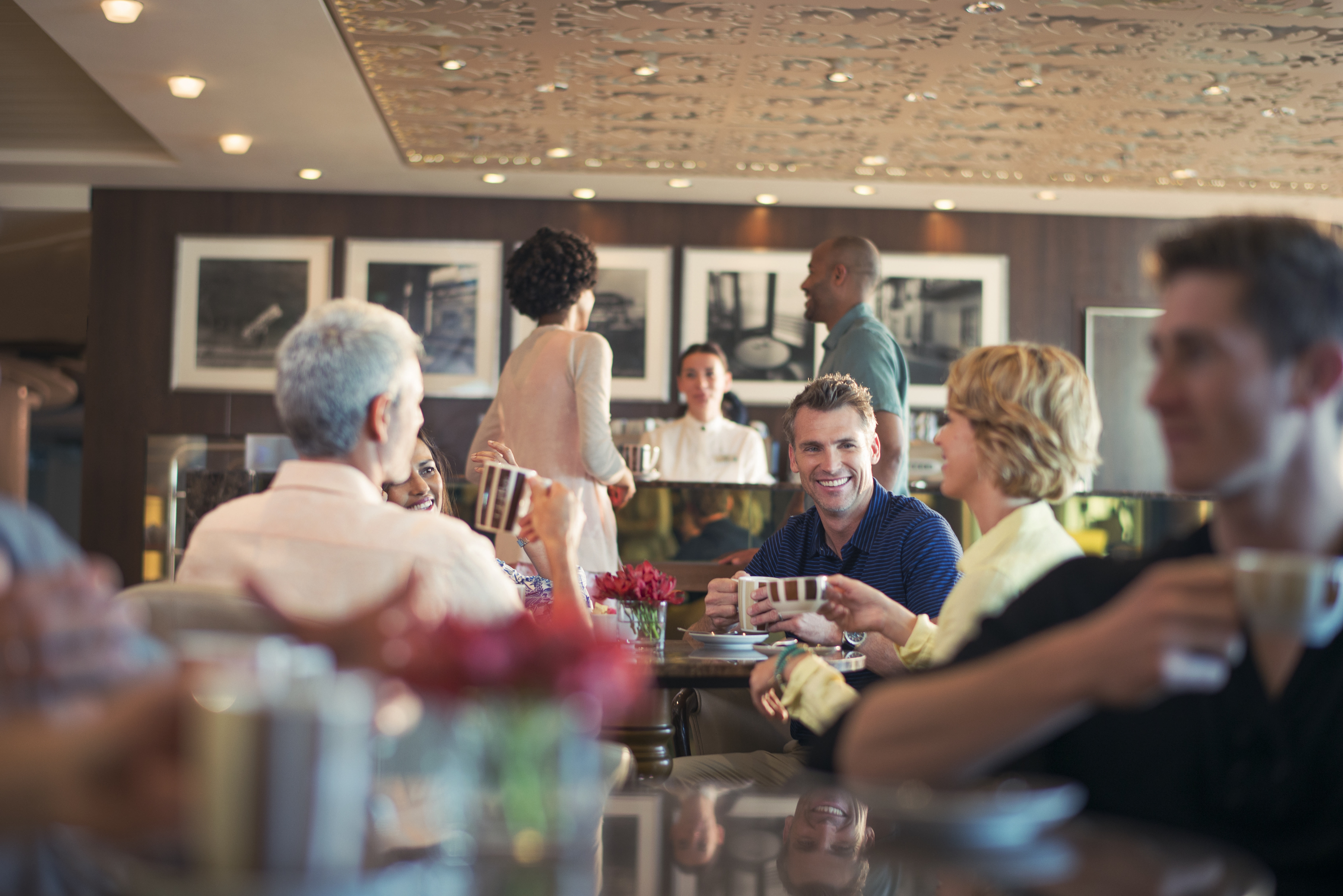 Celebrity Equinox Café Al Bacio guests with coffee under ornate ceiling