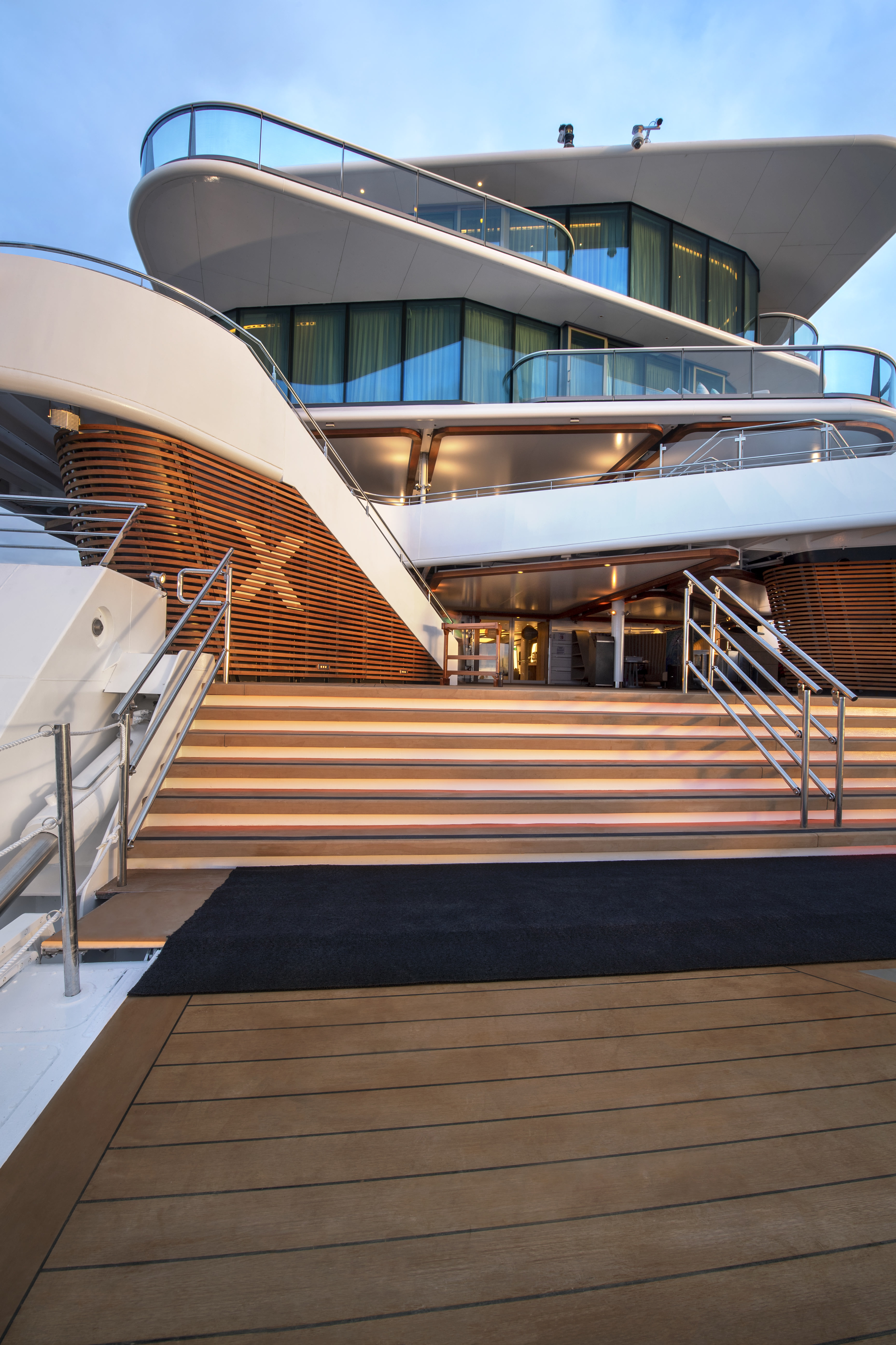Celebrity Flora Marina aft exterior with Celebrity X on timber cladding