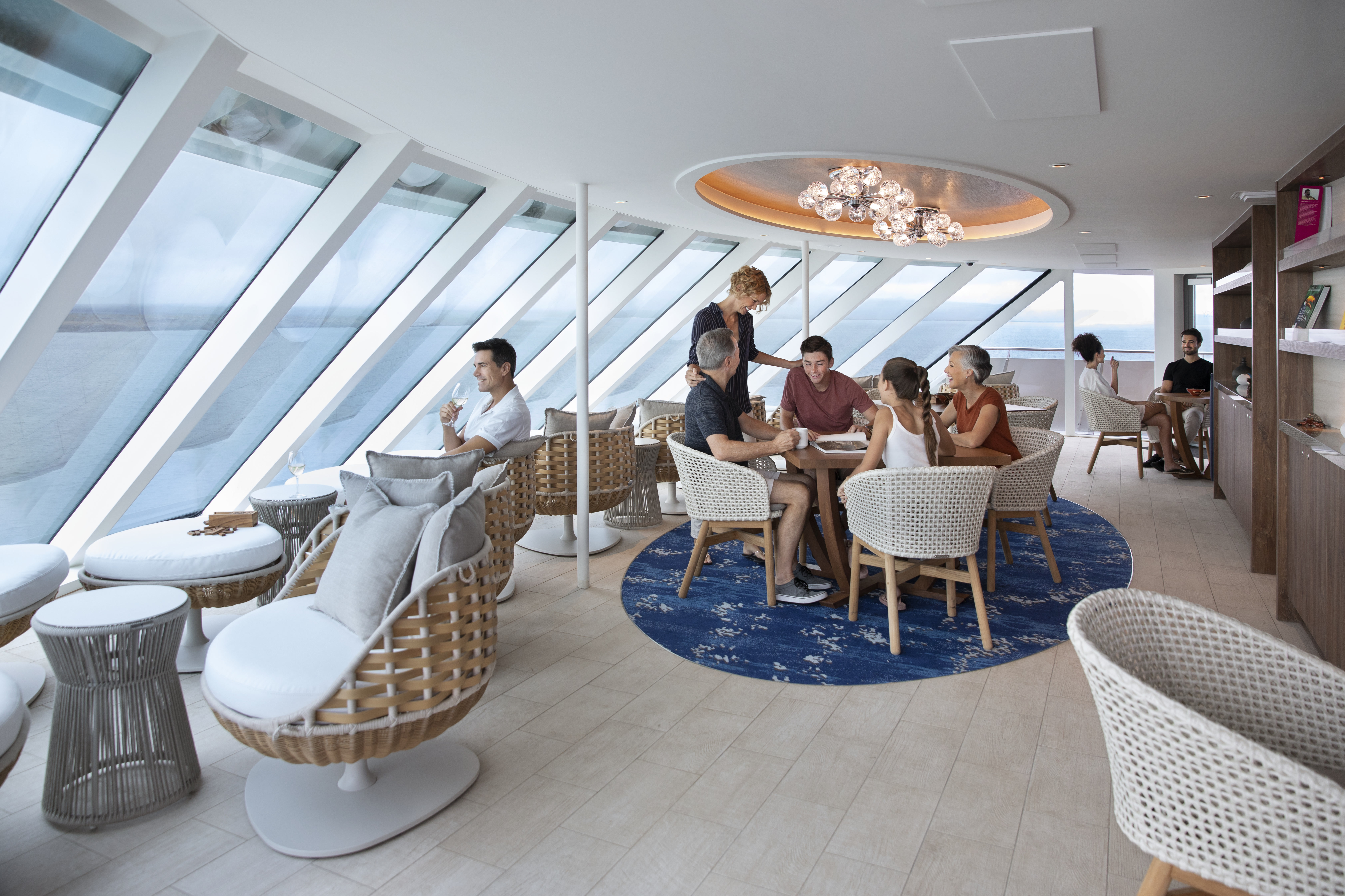 Celebrity Flora Observatory lounge with panoramic ocean windows