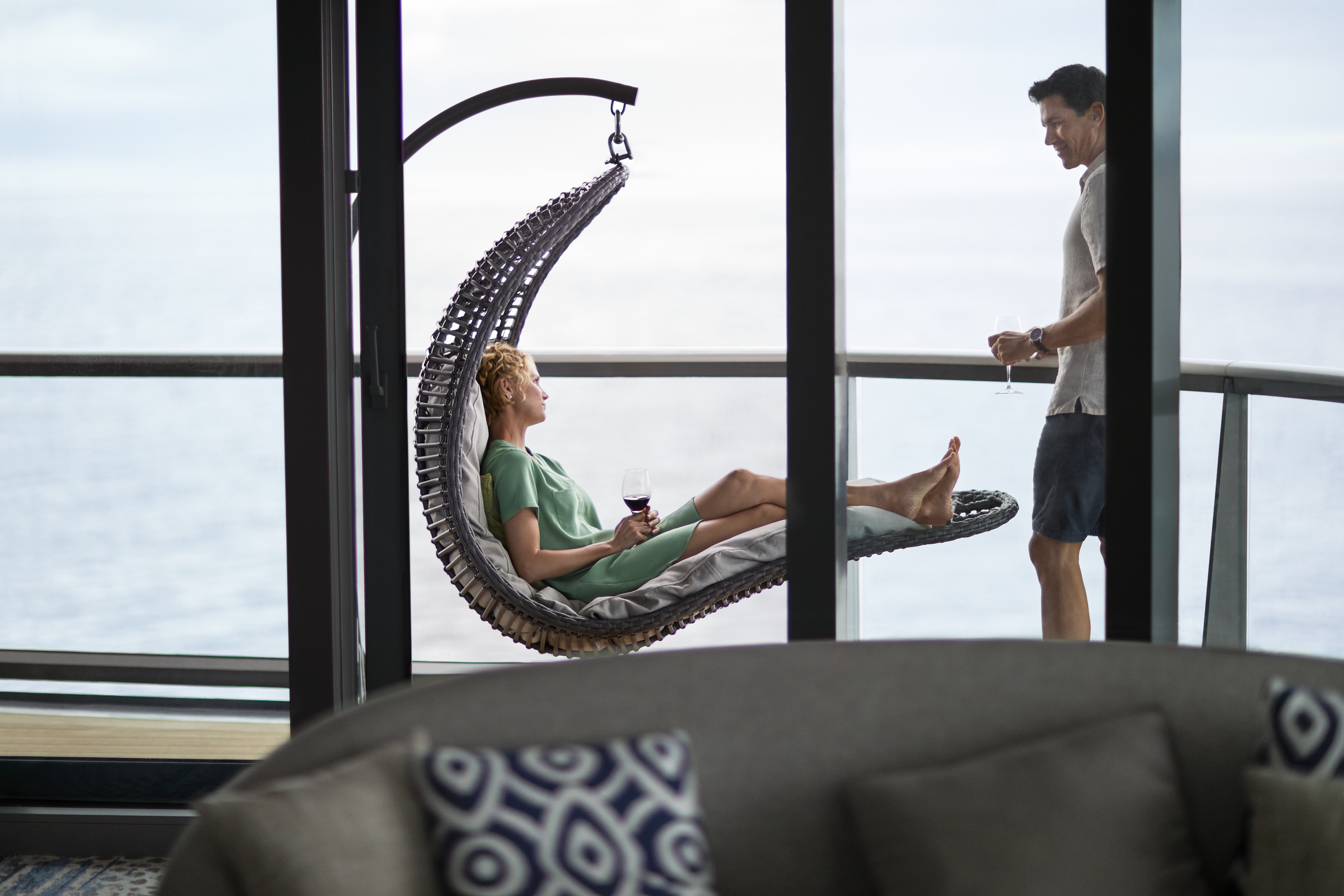 Celebrity Flora Penthouse Suite veranda with hanging chair and ocean view