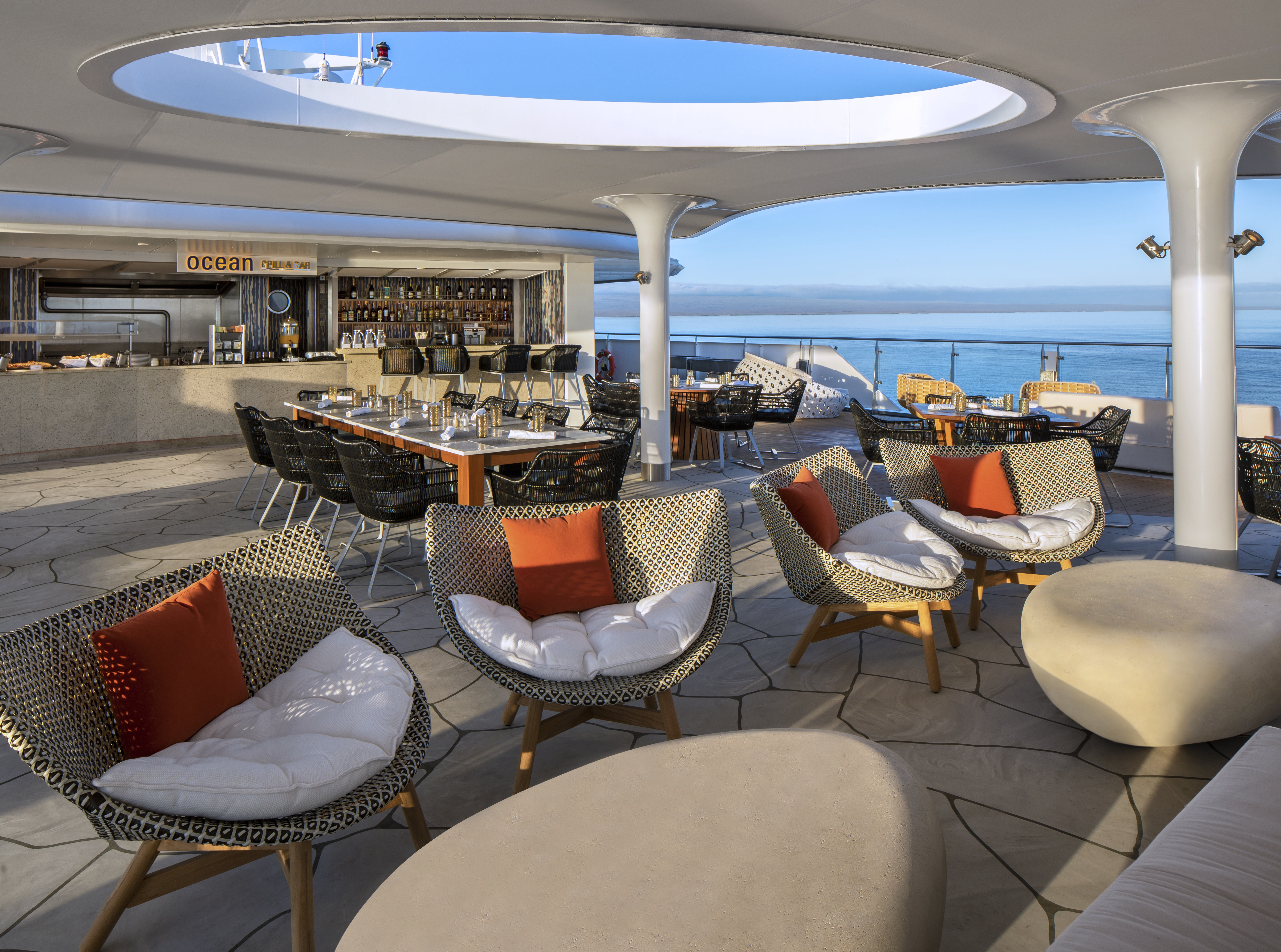 Celebrity Flora Ocean Grill outdoor dining under a circular sky opening