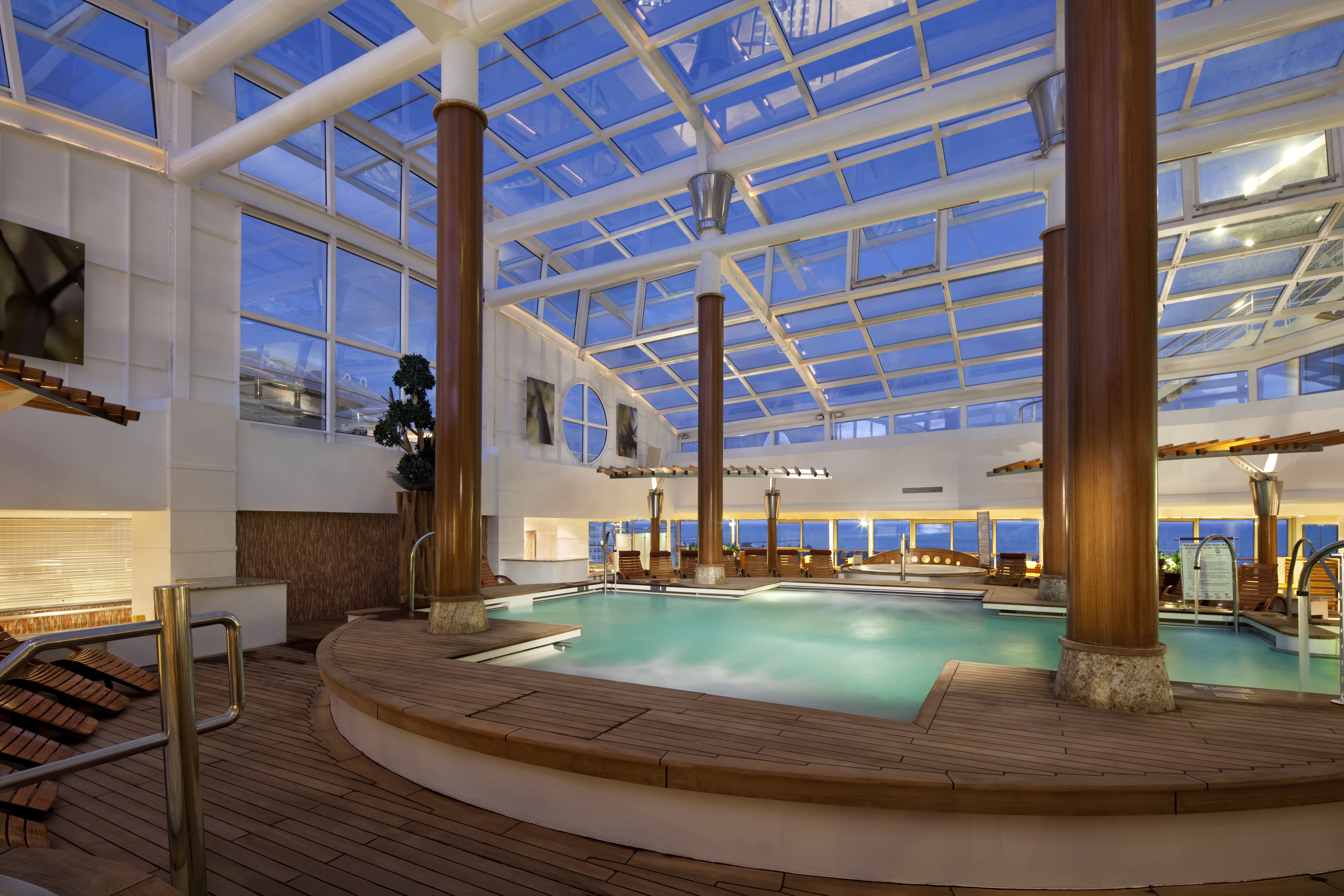 Celebrity Infinity Solarium indoor pool under a glass roof
