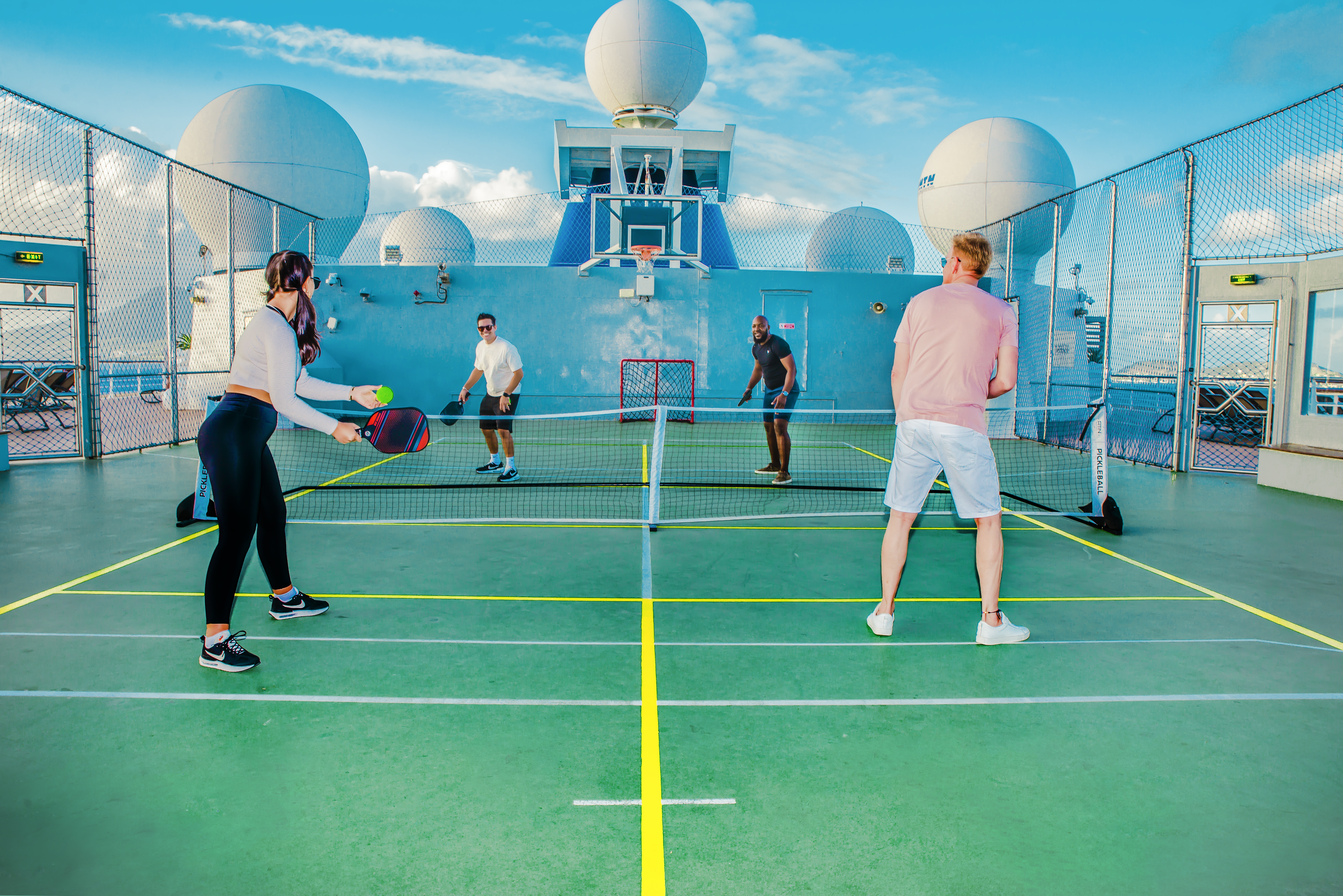 Celebrity Millennium sunny outdoor pickleball on the sports deck