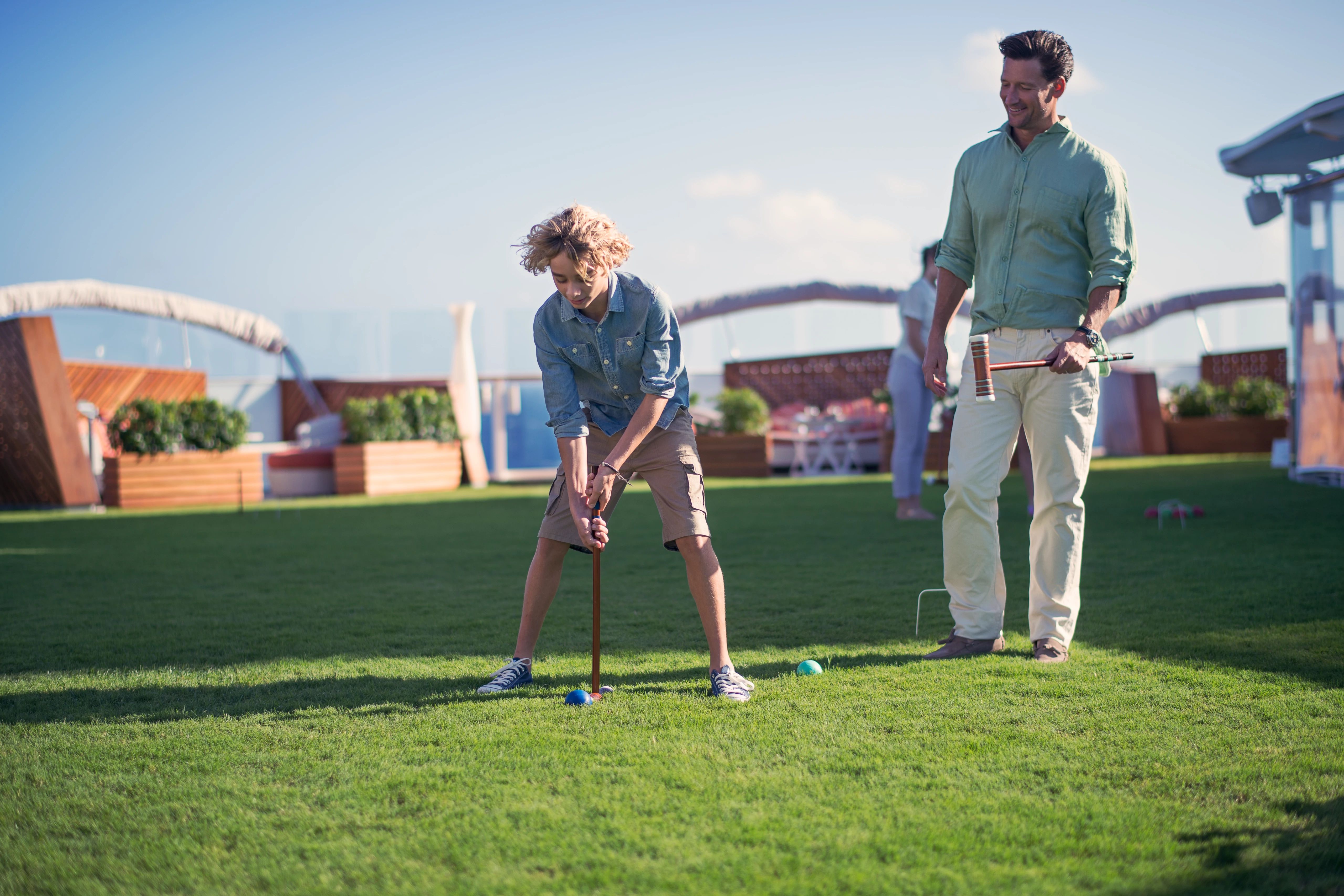 Celebrity Reflection Lawn Club croquet on sunny real grass