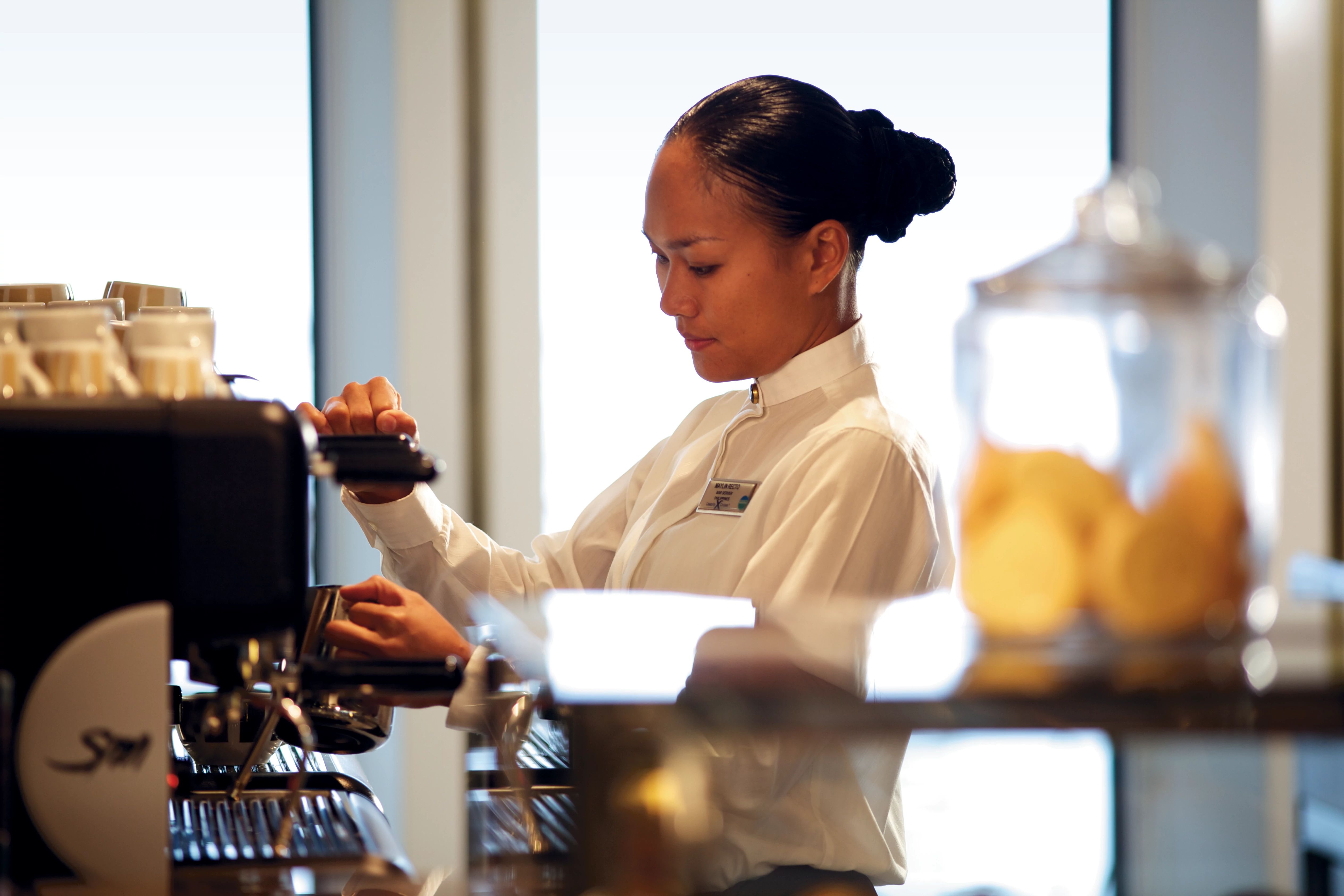 Celebrity Silhouette Café al Baccio barista at the espresso machine
