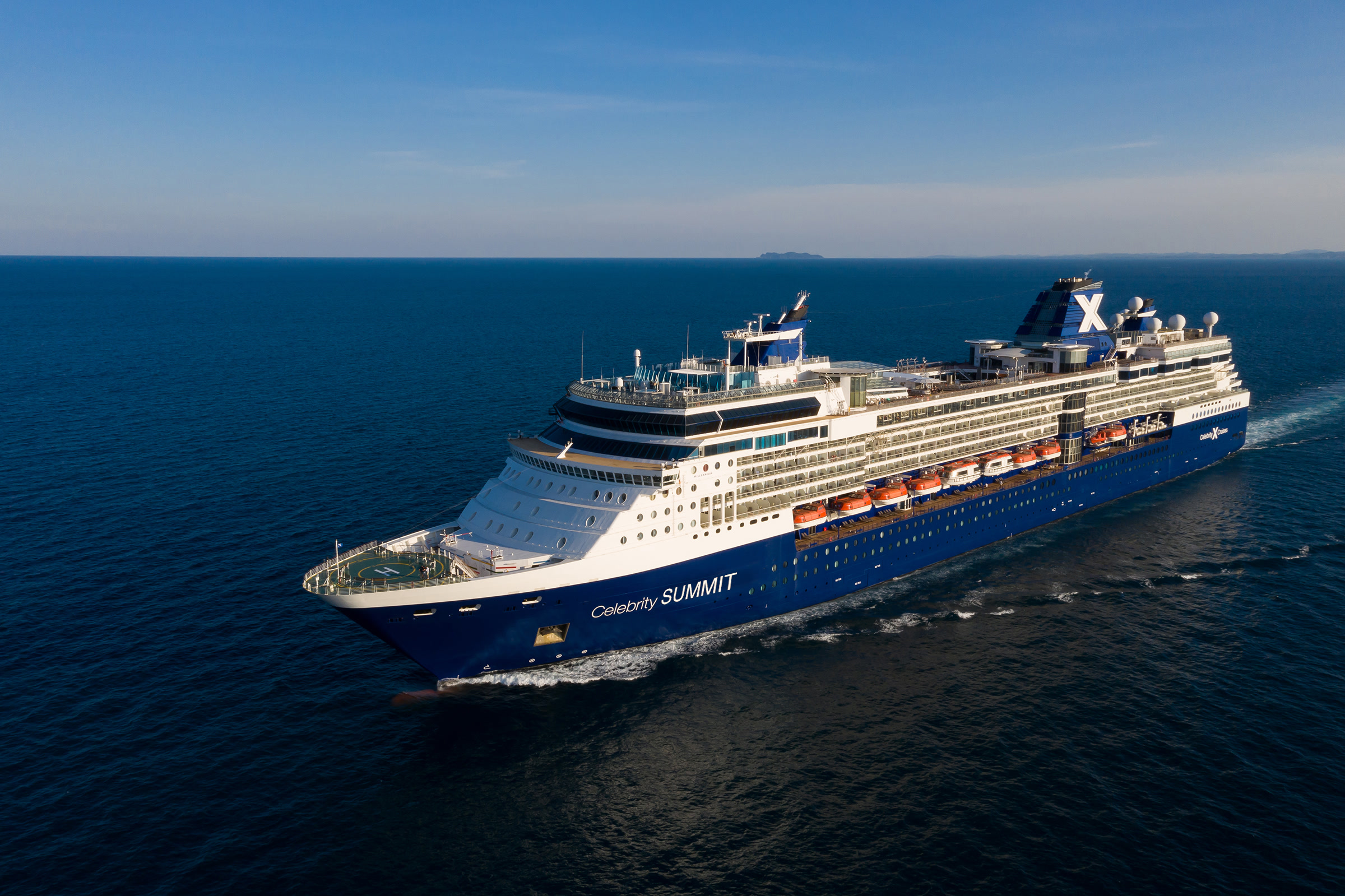 Celebrity Summit sunny blue-hull aerial with SUMMIT on the hull
