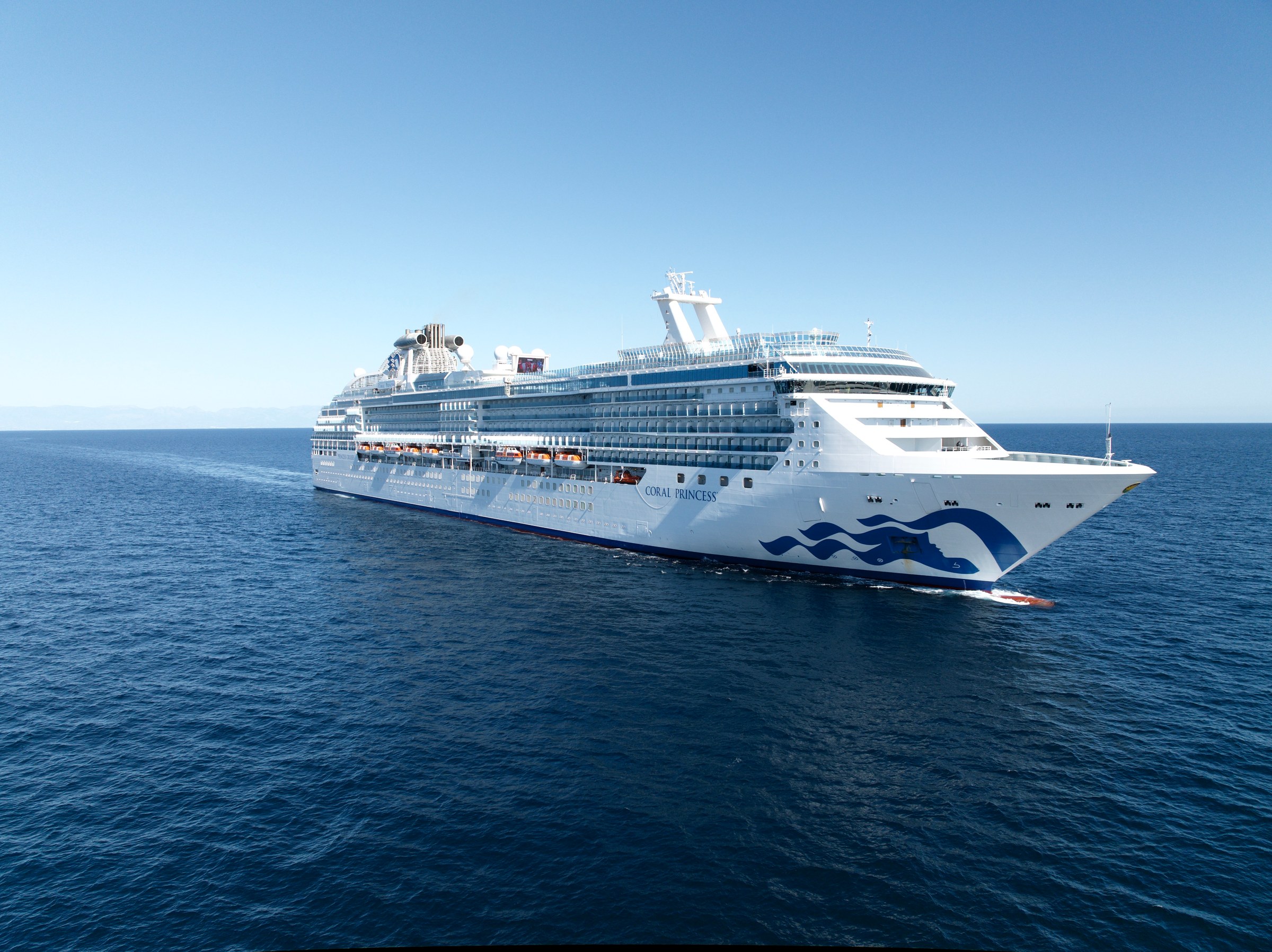 Coral Princess full starboard profile aerial on open sea