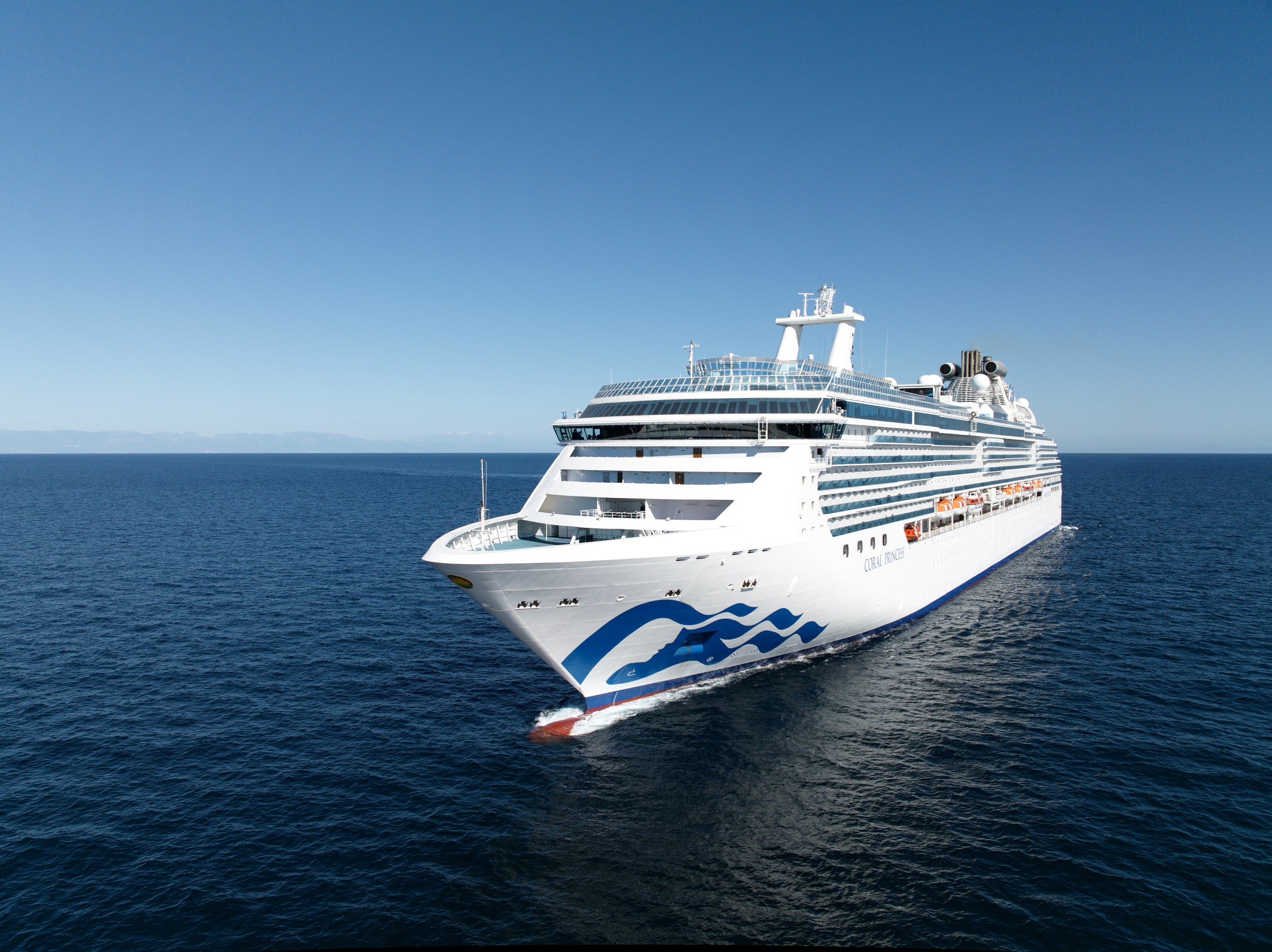 Coral Princess front three-quarter aerial on open water