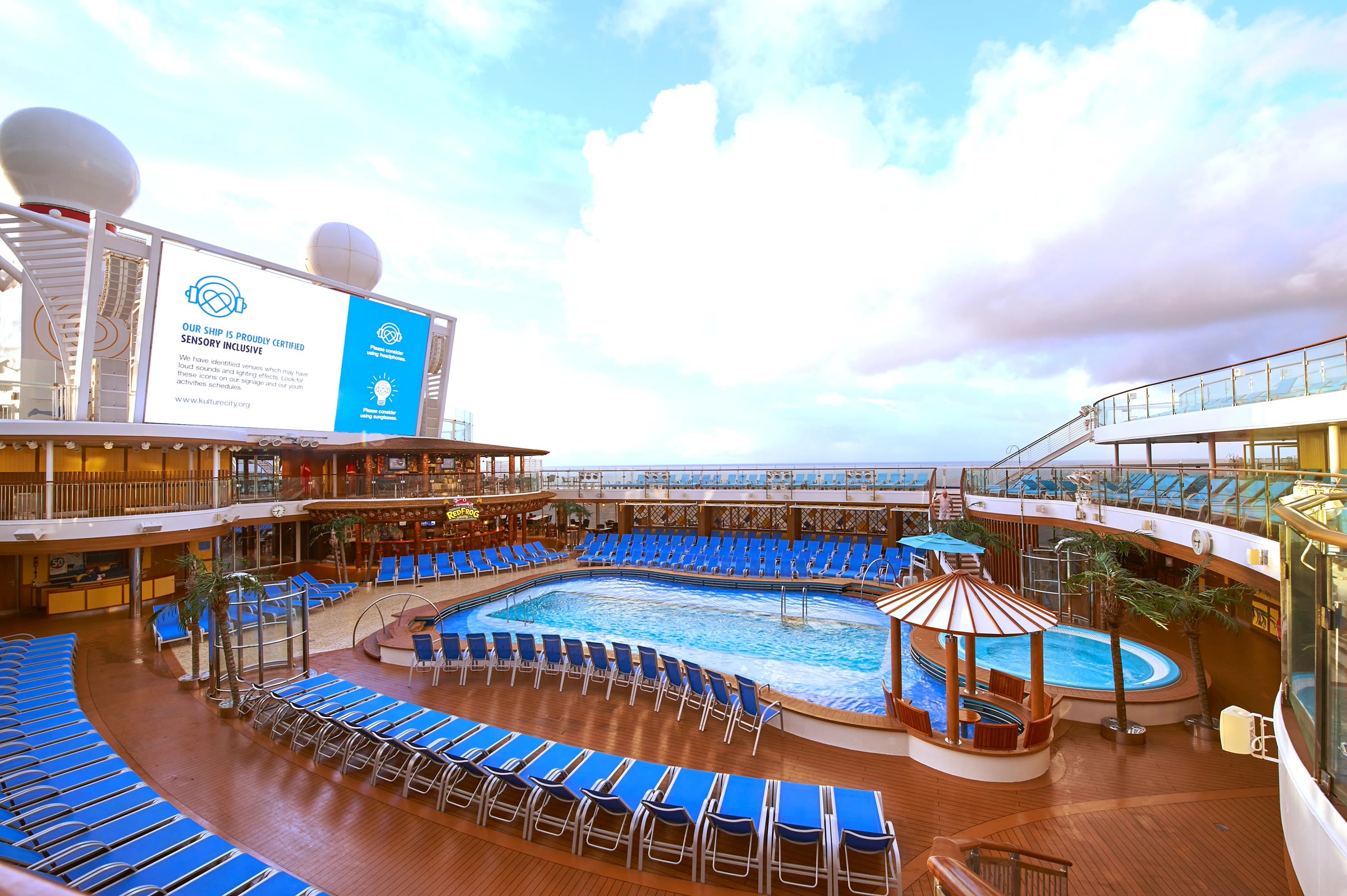 Sunny Beach Pool and RedFrog Tiki Bar deck aboard Mardi Gras
