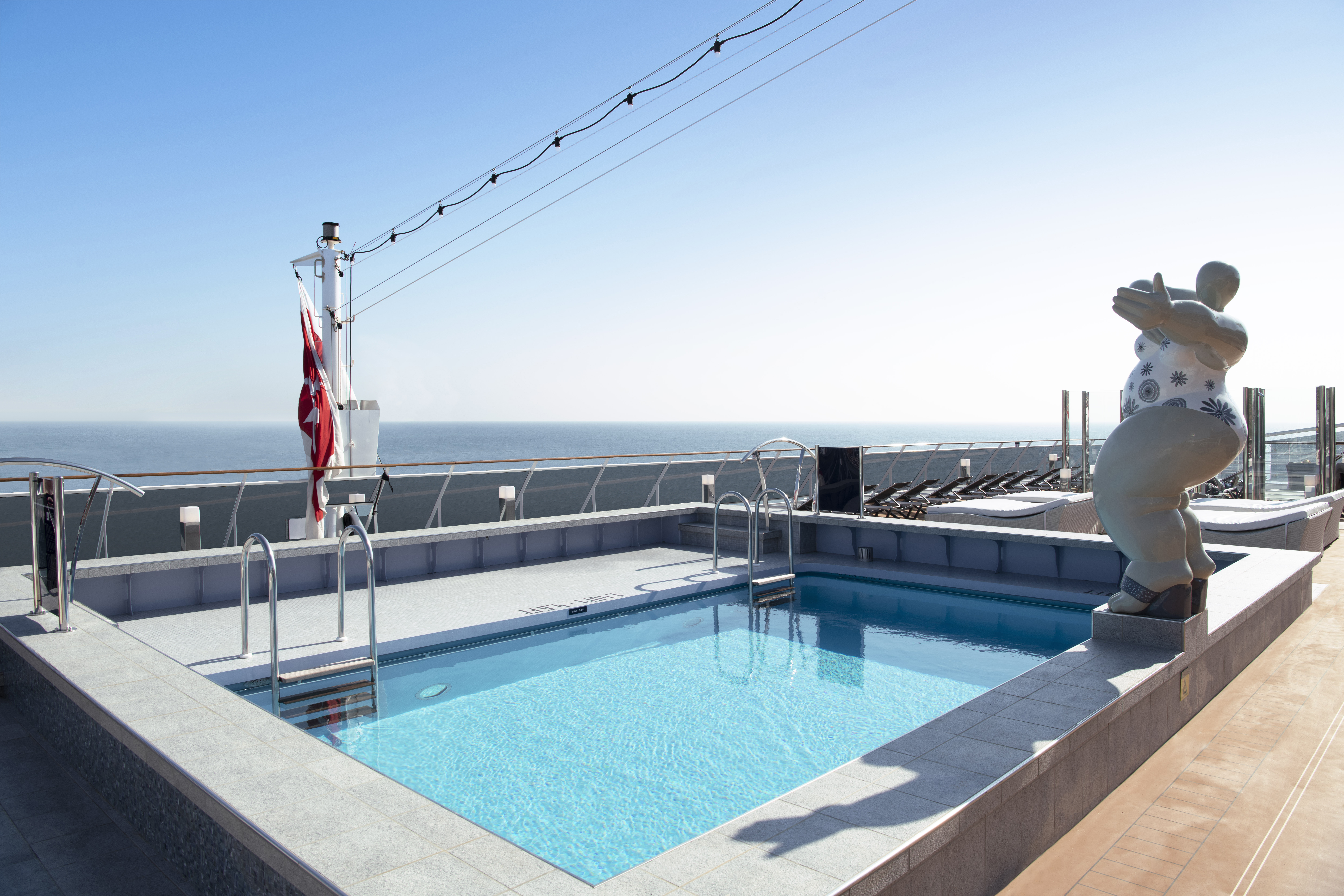 MSC Bellissima Horizon Pool with sculpture overlooking the ocean