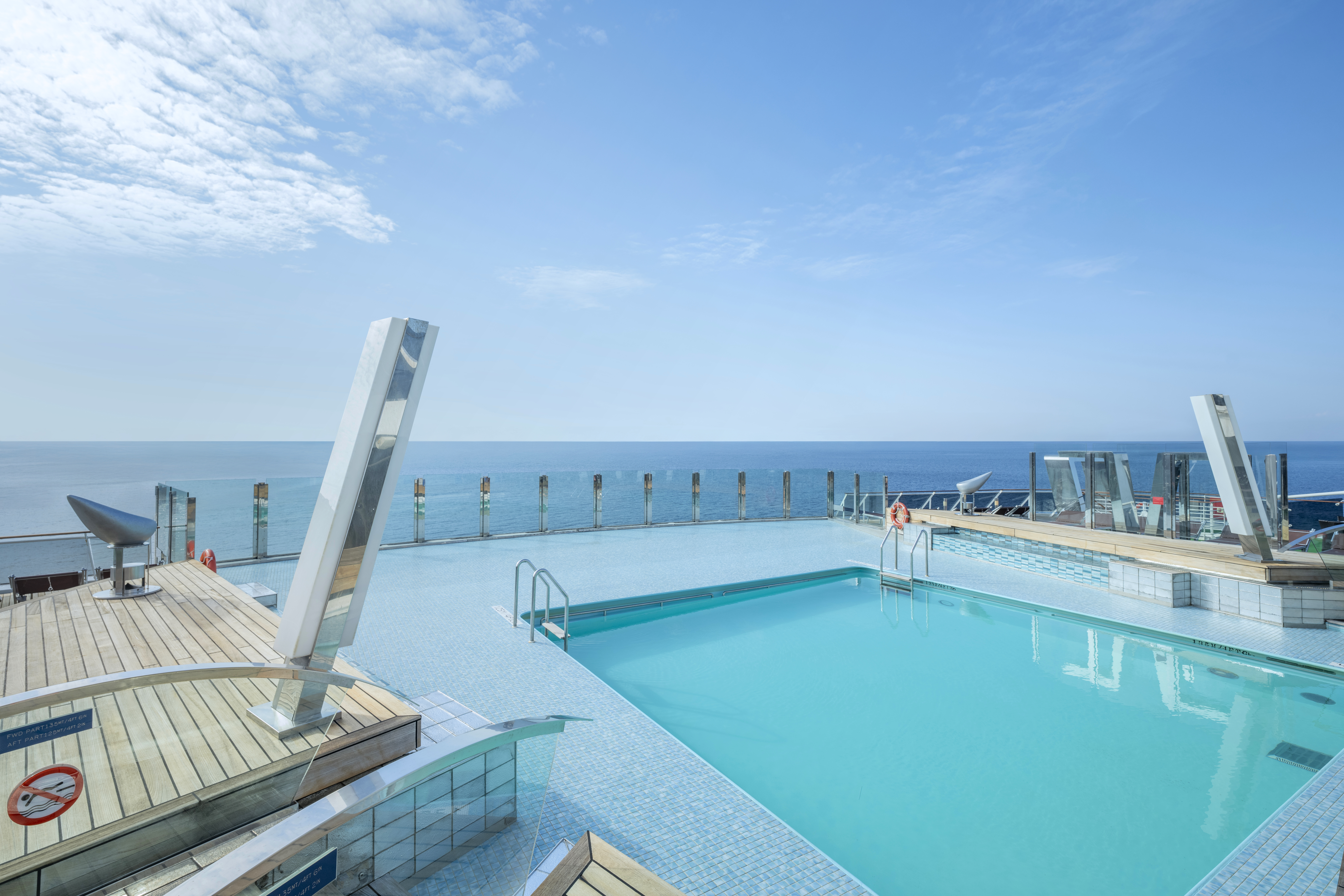 MSC Divina Garden Pool overlooking the ocean on a sunny day