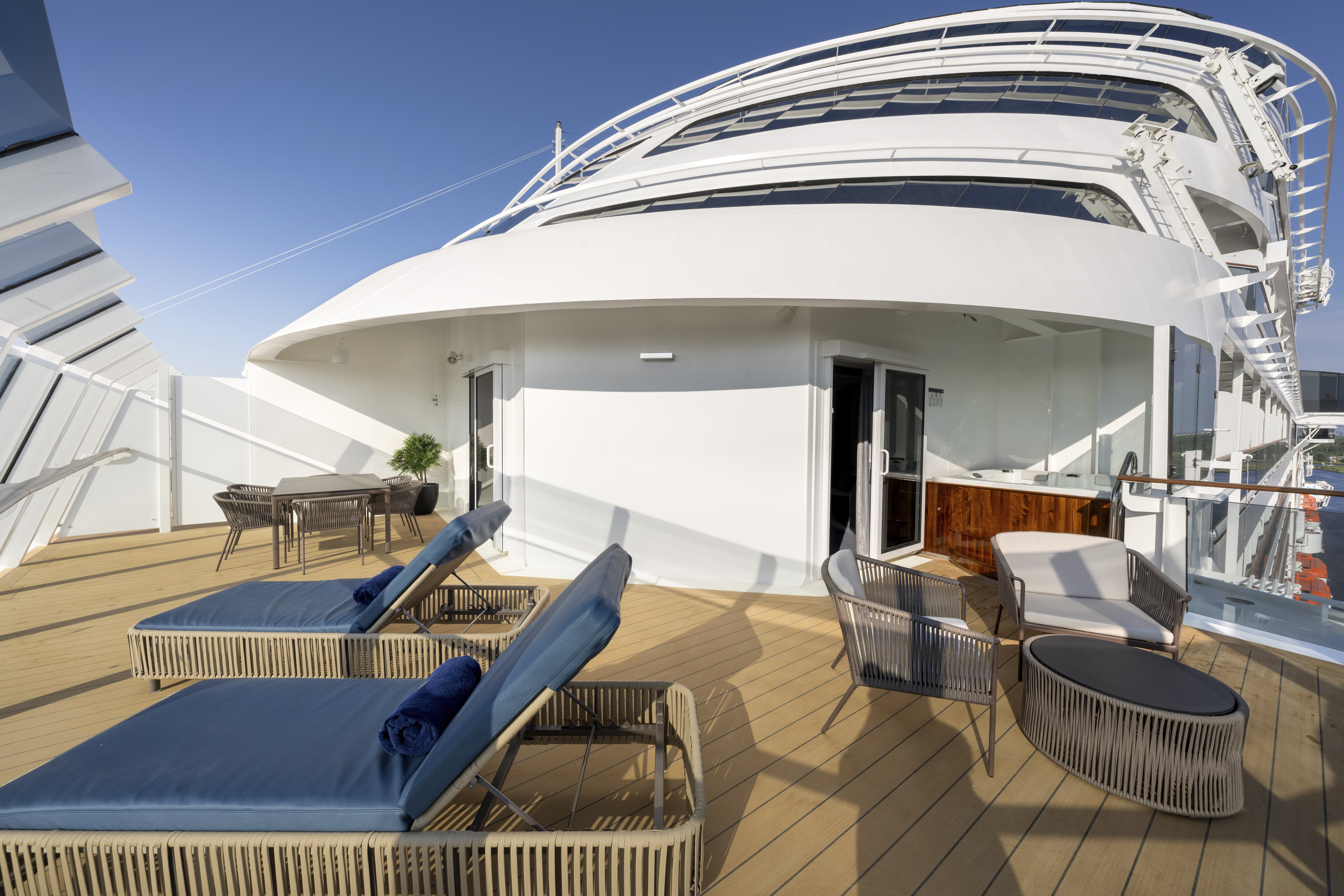 MSC Euribia Yacht Club suite private terrace with whirlpool and loungers
