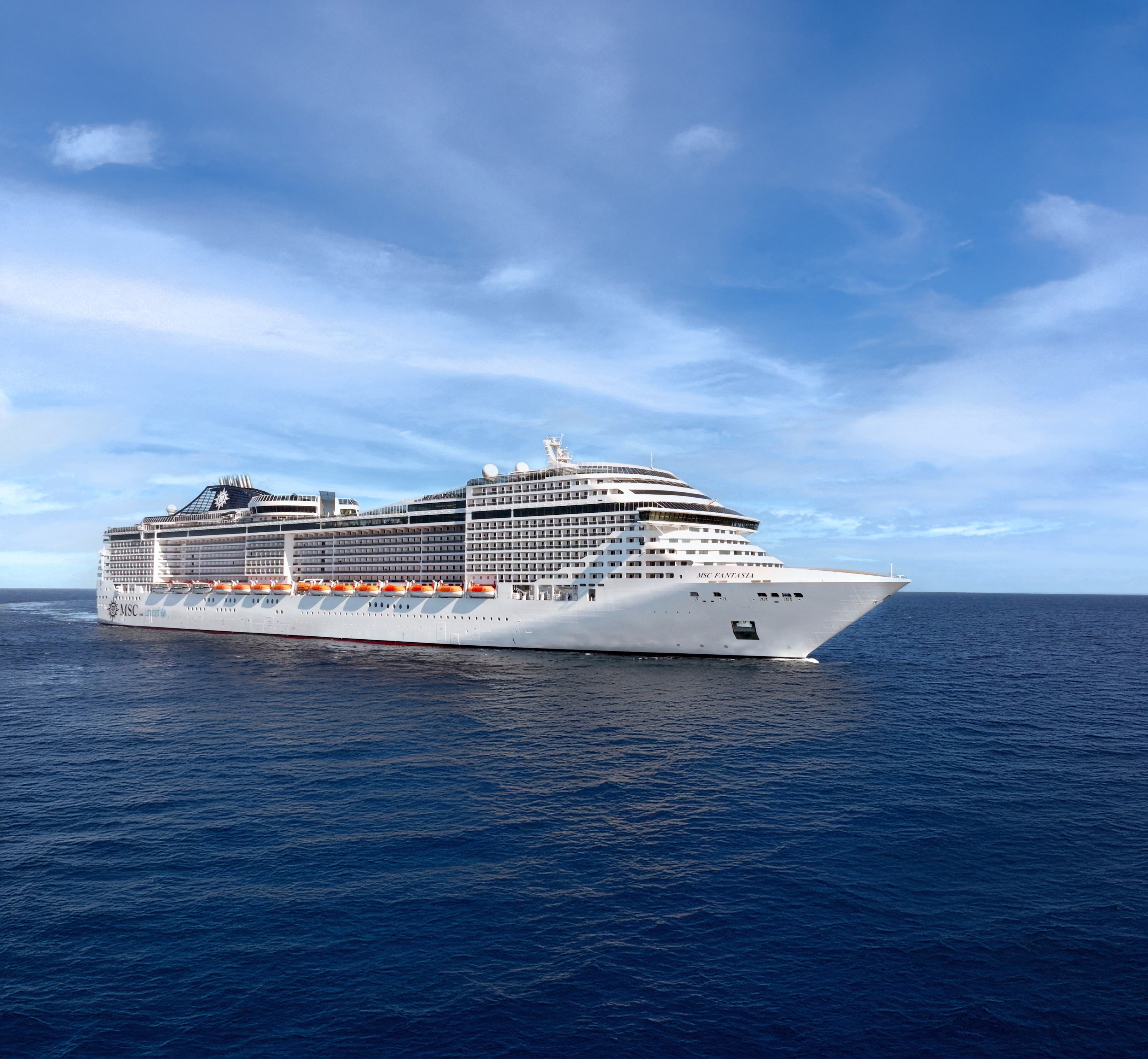 MSC Fantasia starboard aerial underway under a clear blue sky